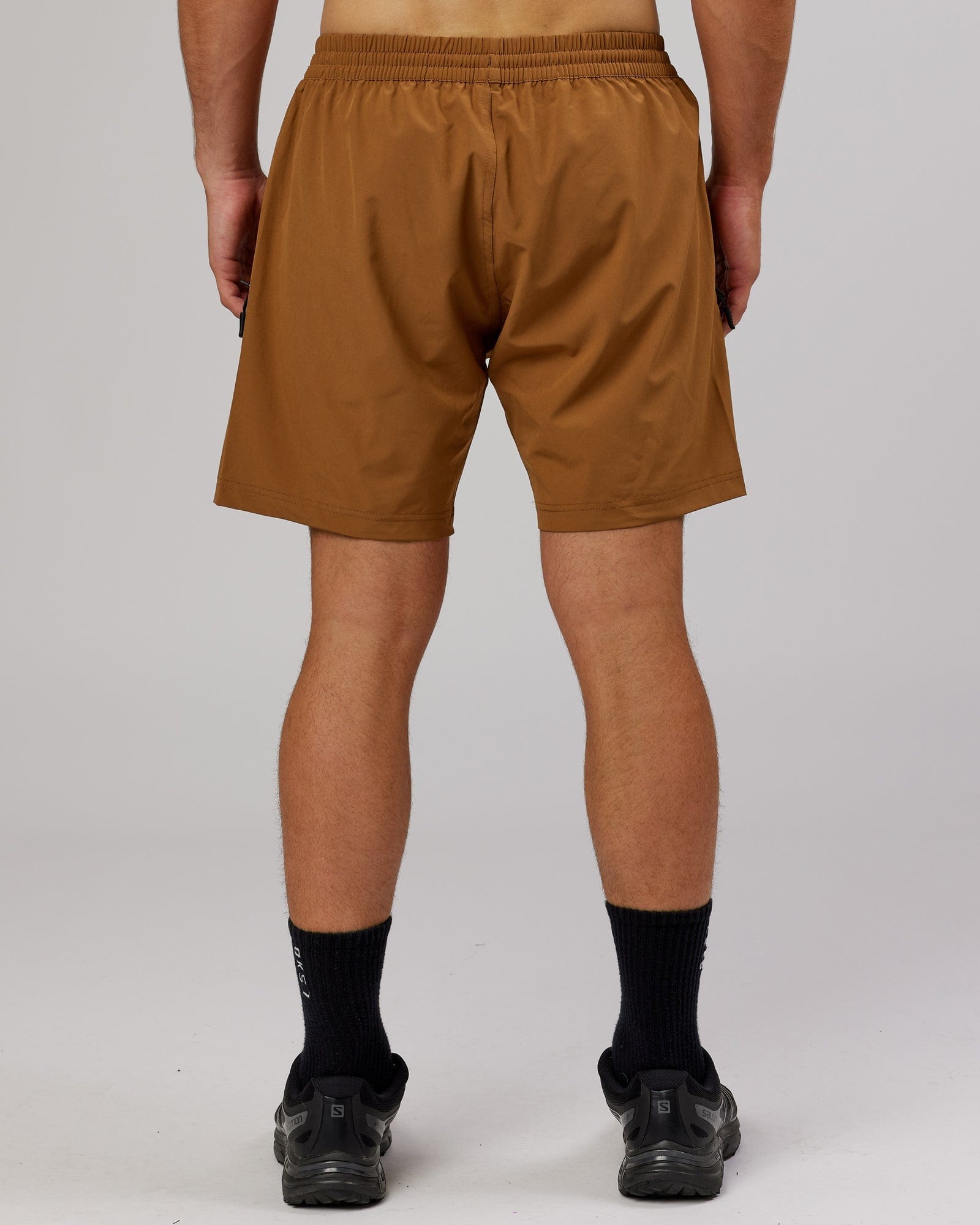 Model wearing Rep 7'' Performance Short - Camel