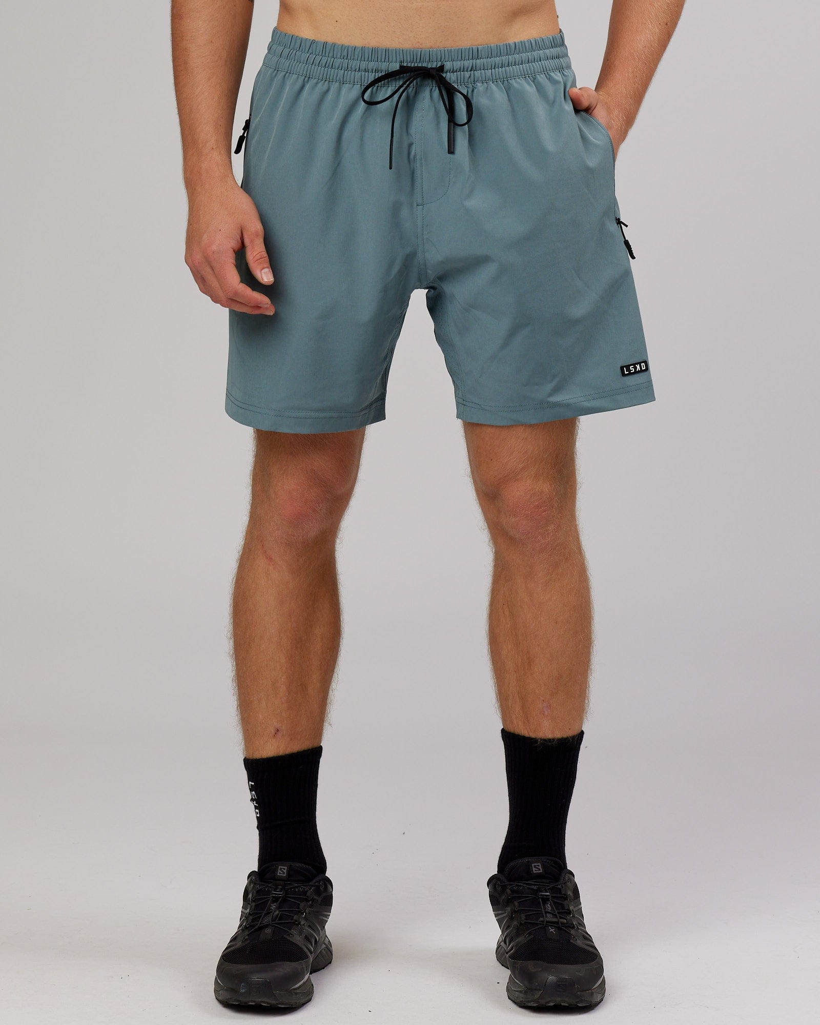 Model wearing Rep 7'' Performance Short - Eclipse