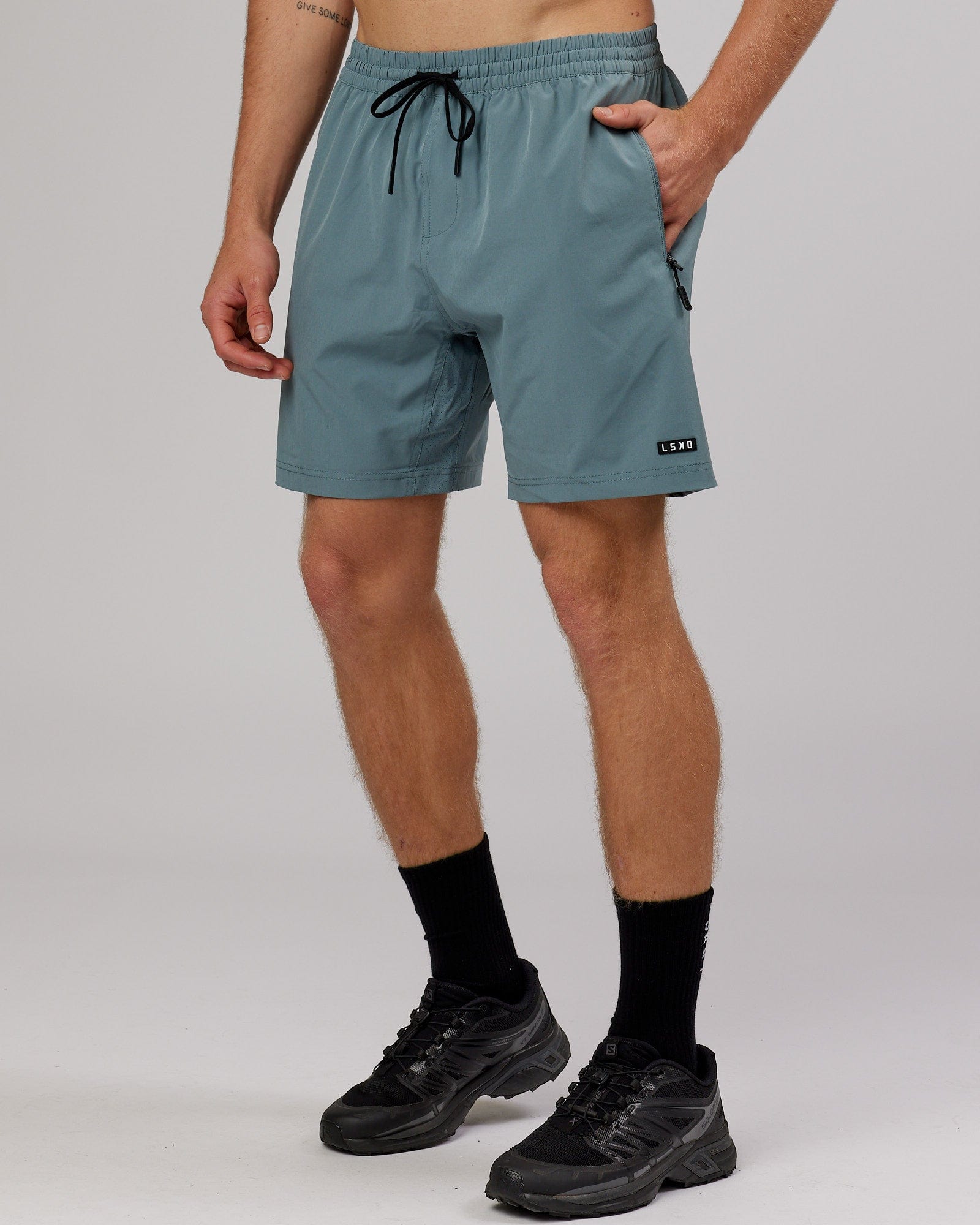 Model wearing Rep 7'' Performance Short - Eclipse