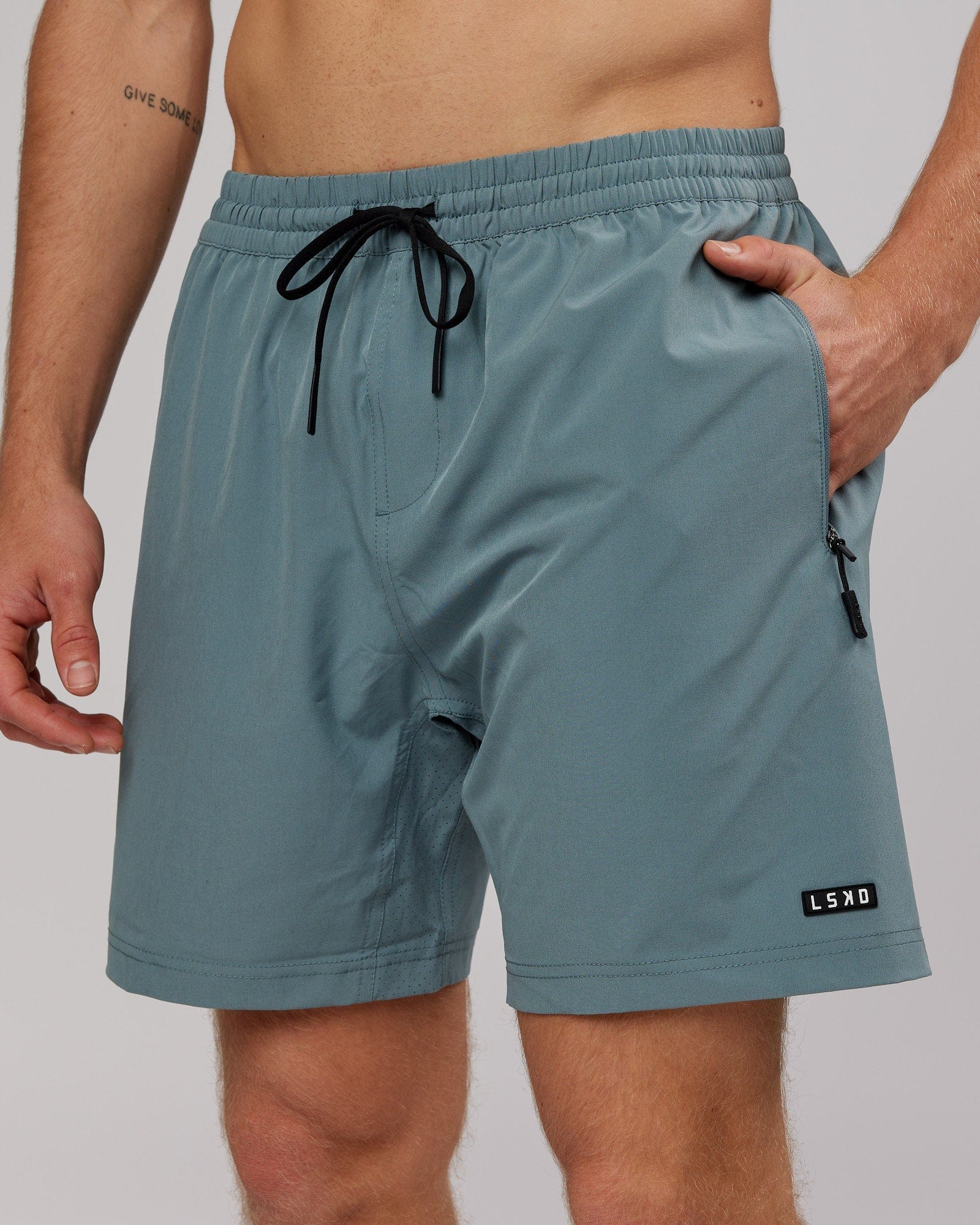Model wearing Rep 7'' Performance Short - Eclipse