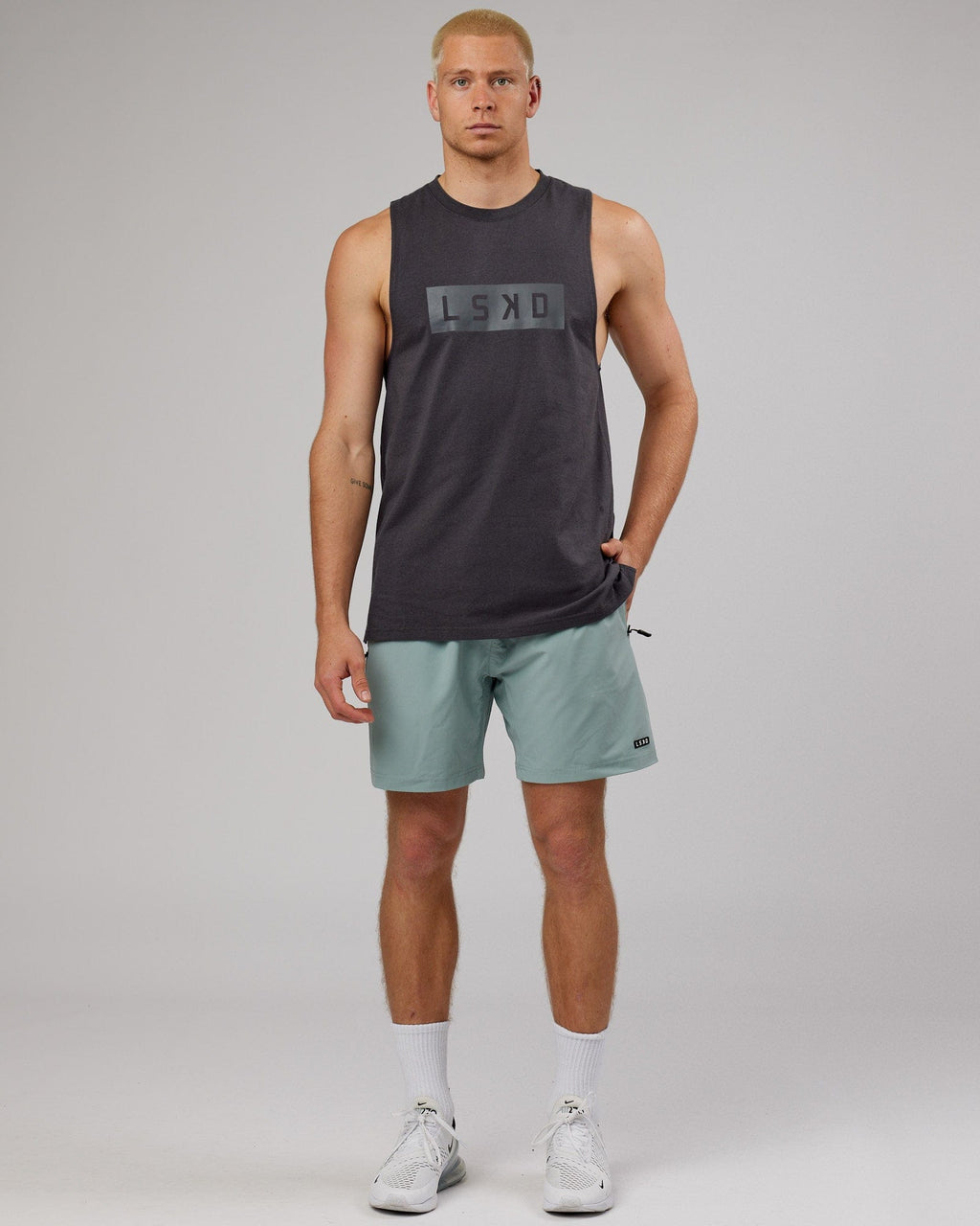 Model wearing Rep 7'' Performance Short - Frost