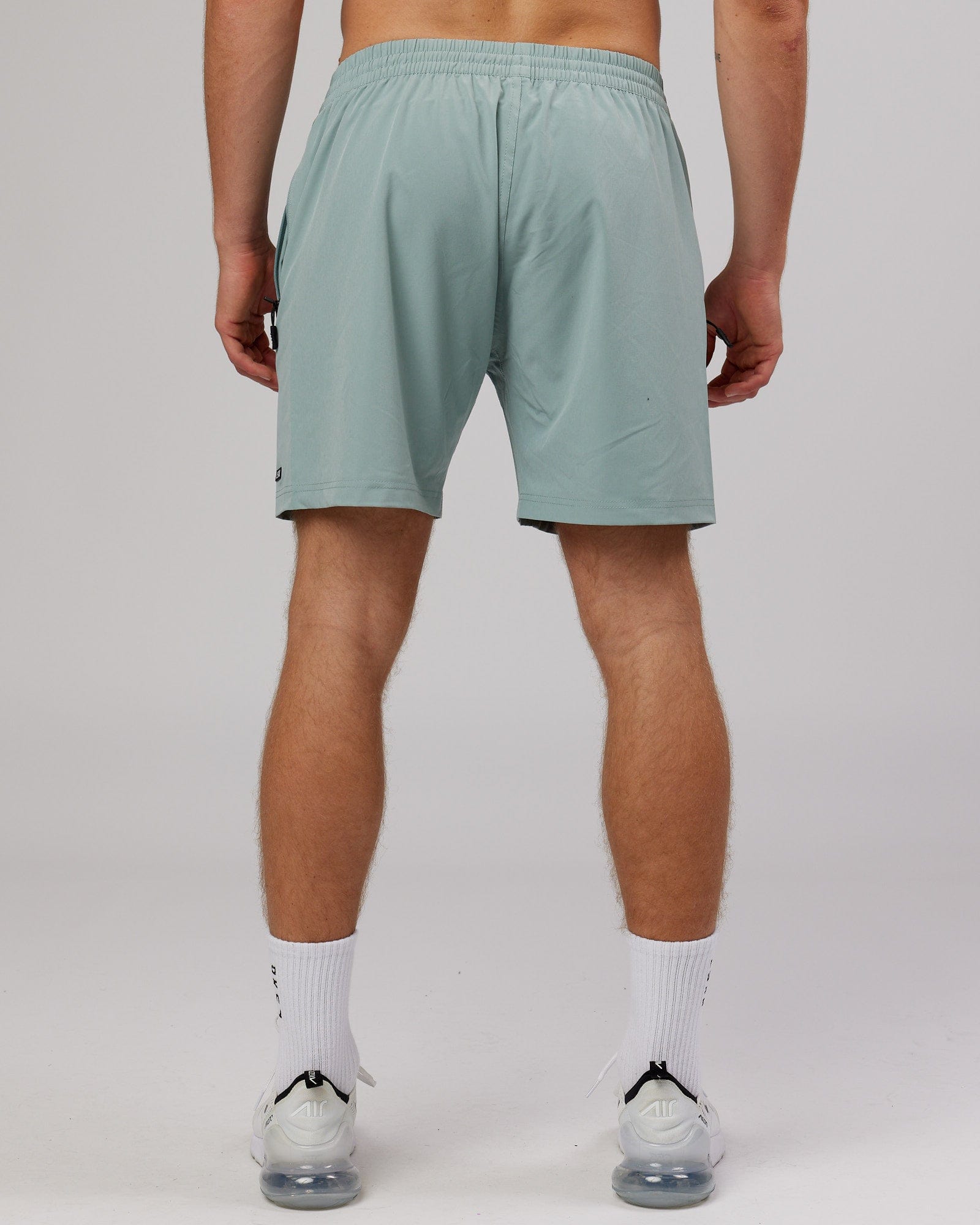 Model wearing Rep 7'' Performance Short - Frost