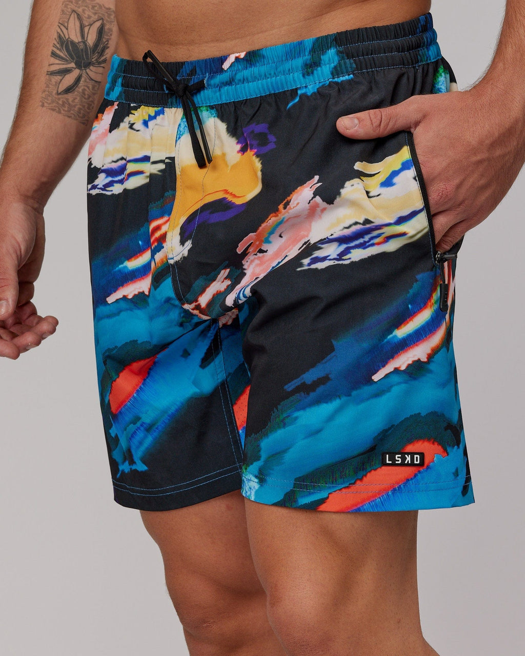 Model wearing Rep 7" Performance Short - Glitch-Black