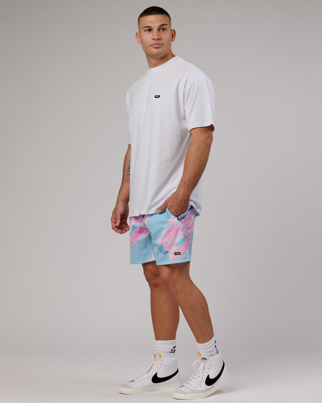Model wearing Rep 7'' Performance Short - Glitch-Blue