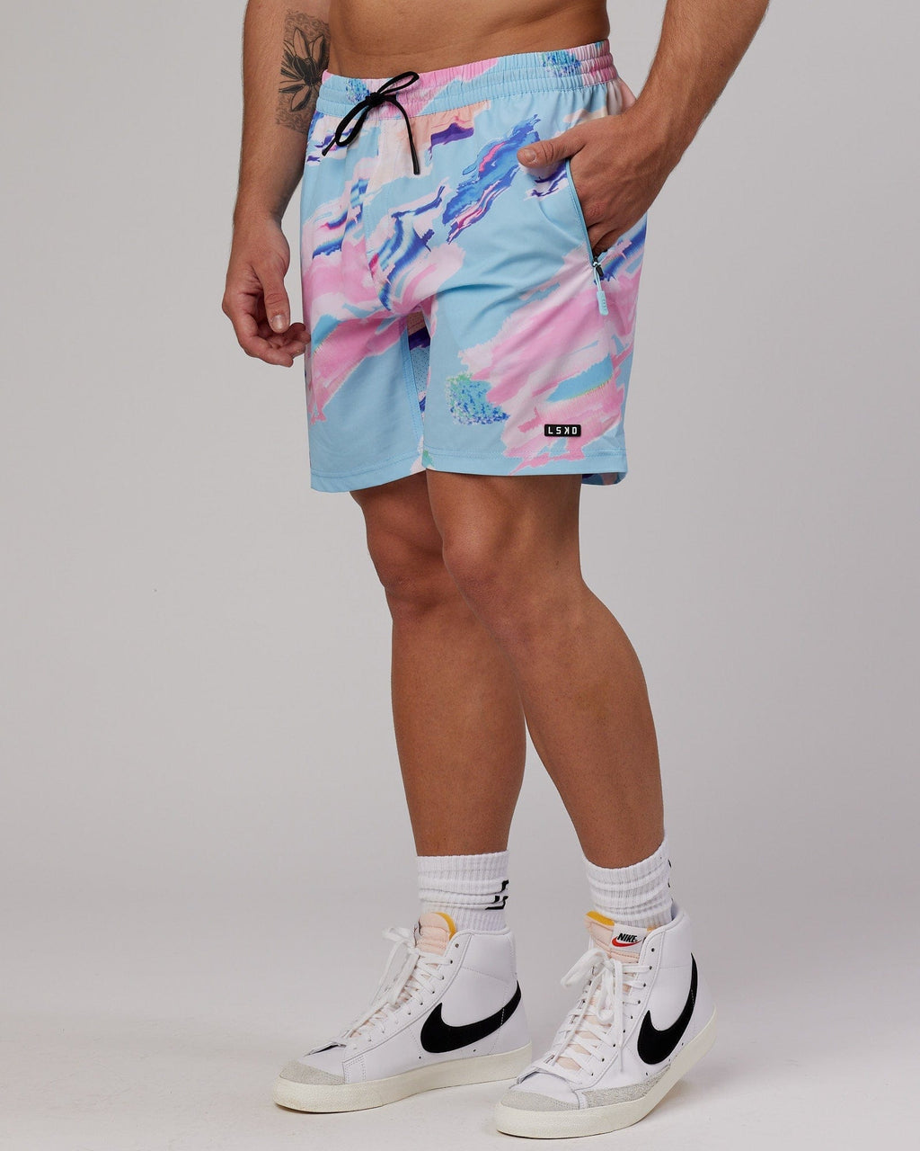 Model wearing Rep 7'' Performance Short - Glitch-Blue