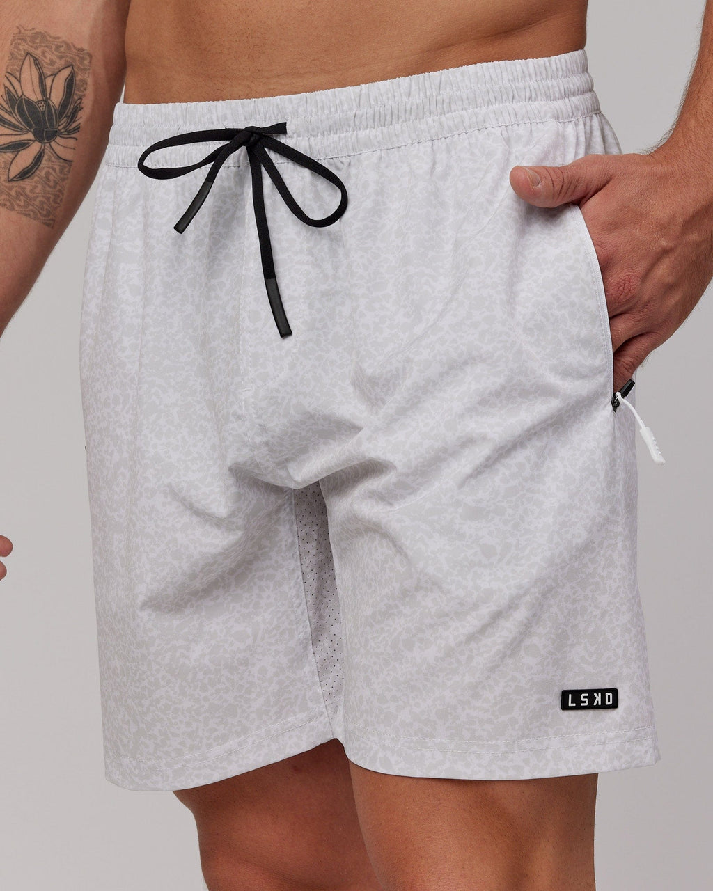 Model wearing Rep 7'' Performance Short - White Etching