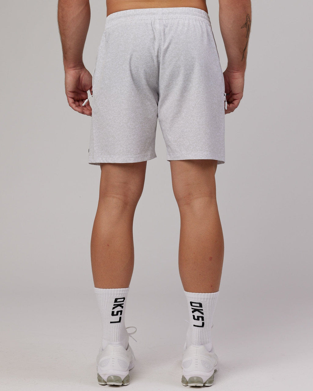 Model wearing Rep 7'' Performance Short - White Etching