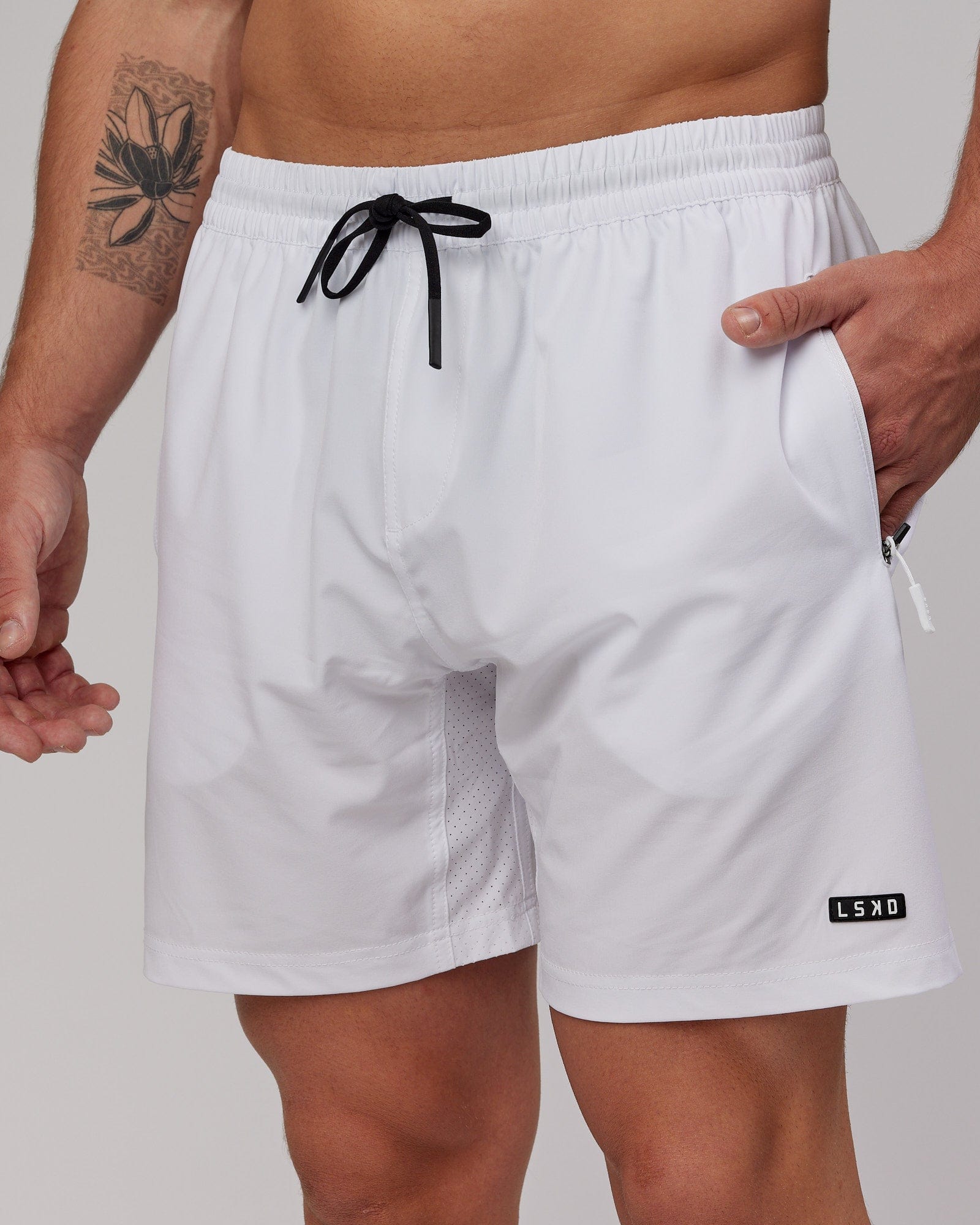 Model wearing Rep 7" Performance Short - White
