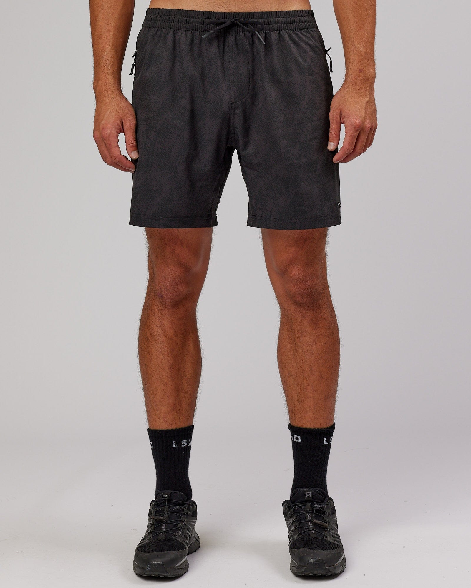 Model wearing Rep 7'' Performance Short - Black Atom