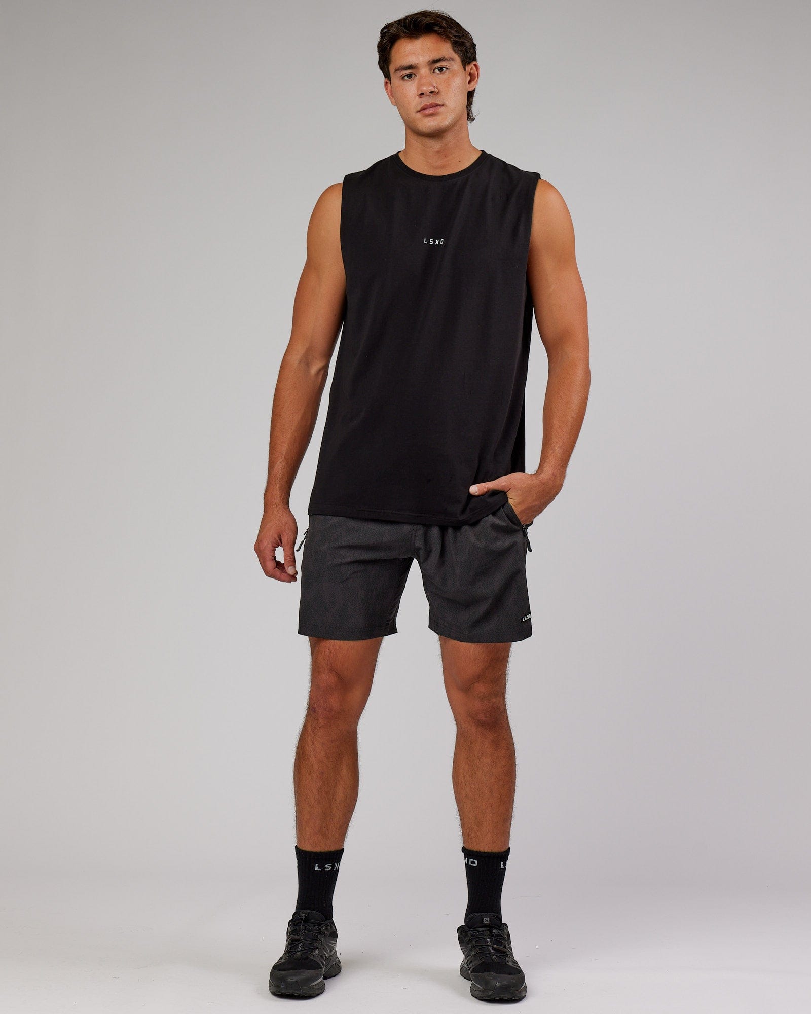 Model wearing Rep 7'' Performance Short - Black Atom