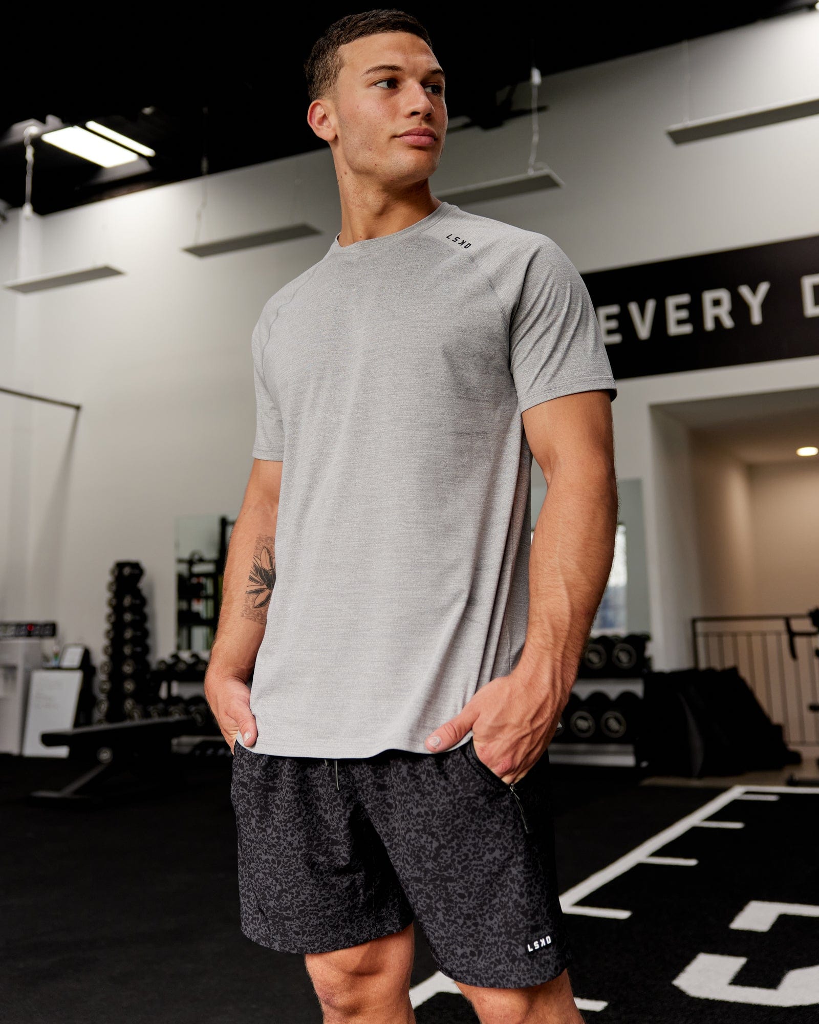 Model wearing Rep 7" Performance Short - Black Etching