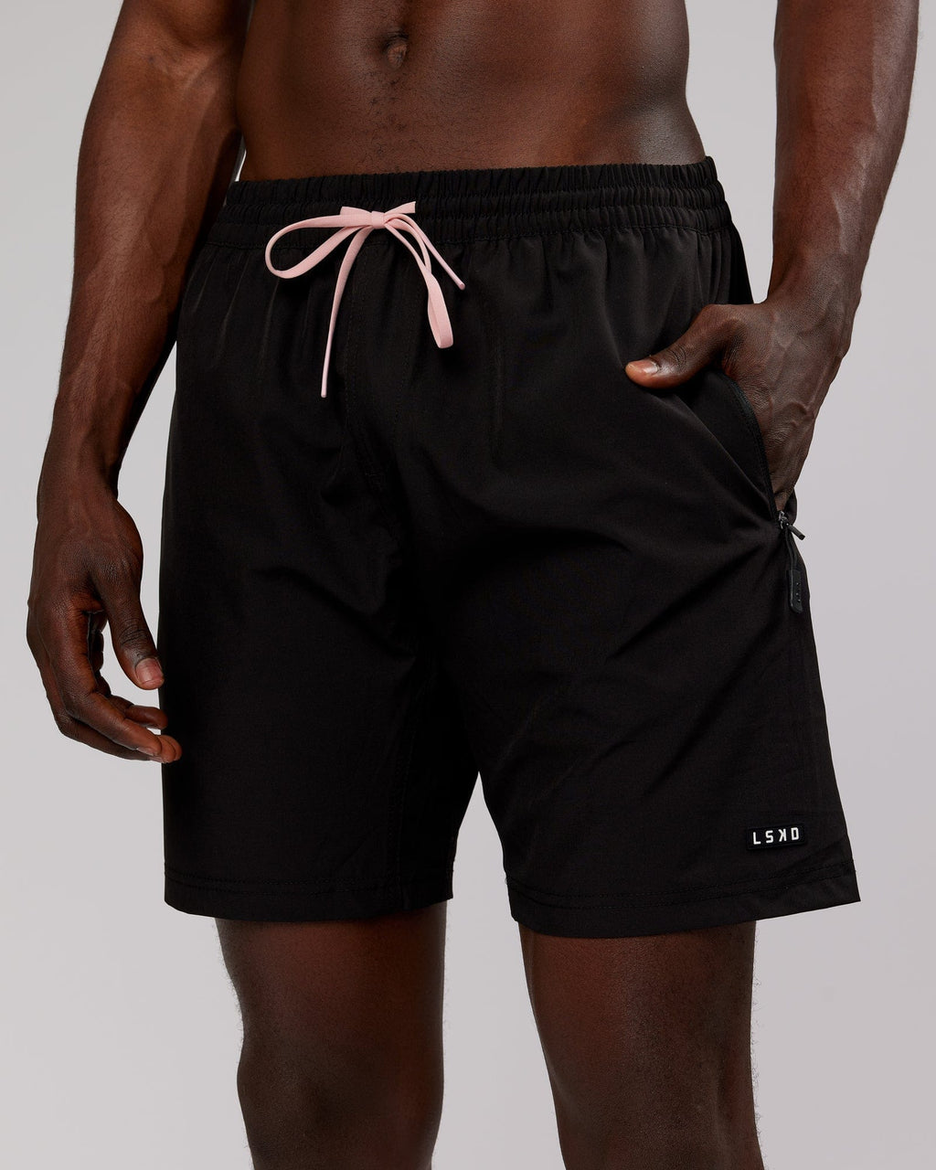 Model wearing Rep 7'' Performance Short - Black-Pink