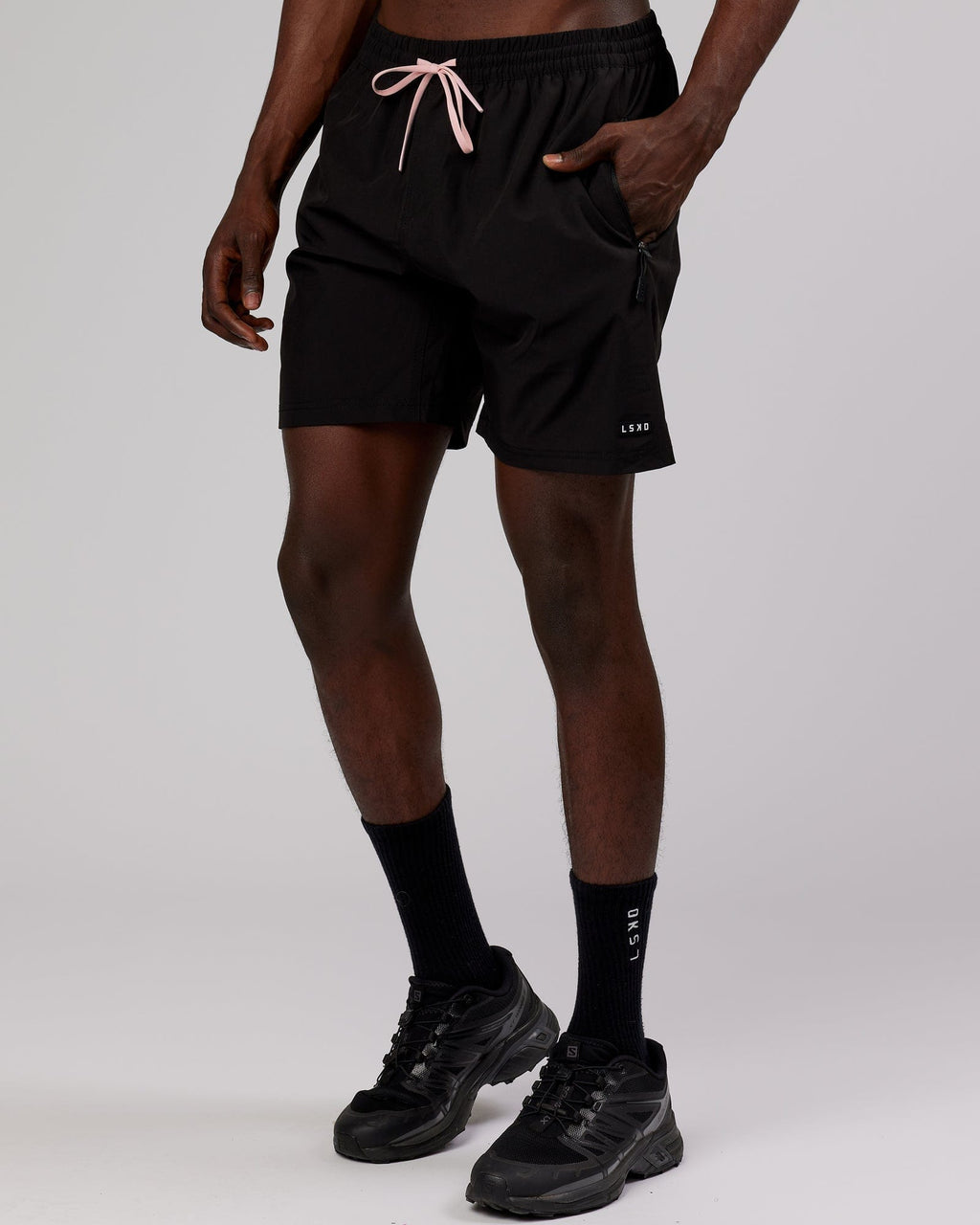 Model wearing Rep 7'' Performance Short - Black-Pink