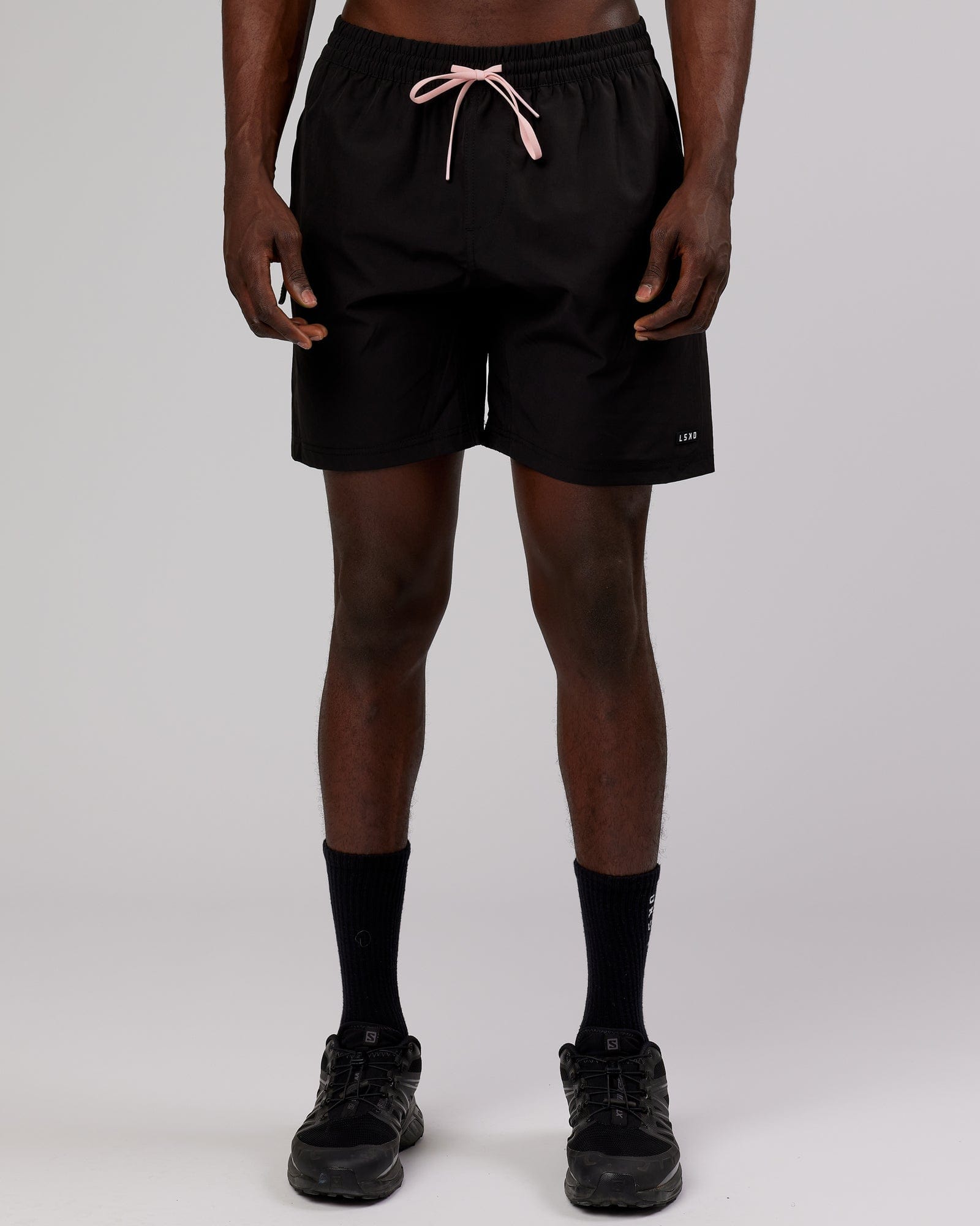 Model wearing Rep 7'' Performance Short - Black-Pink