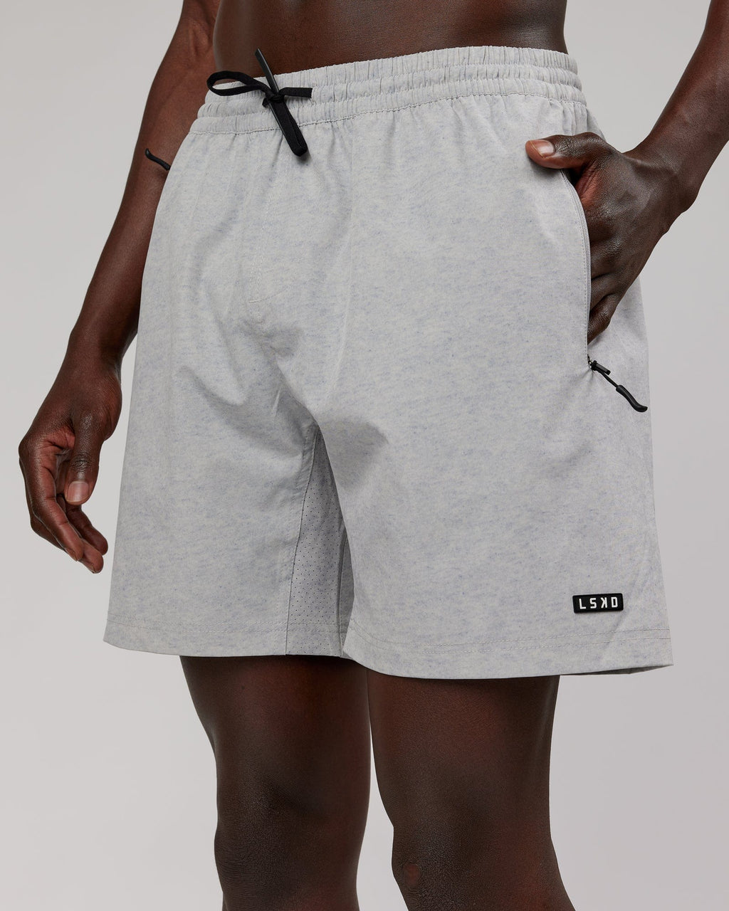 Model wearing Rep 7" Performance Short - Light Grey Marl