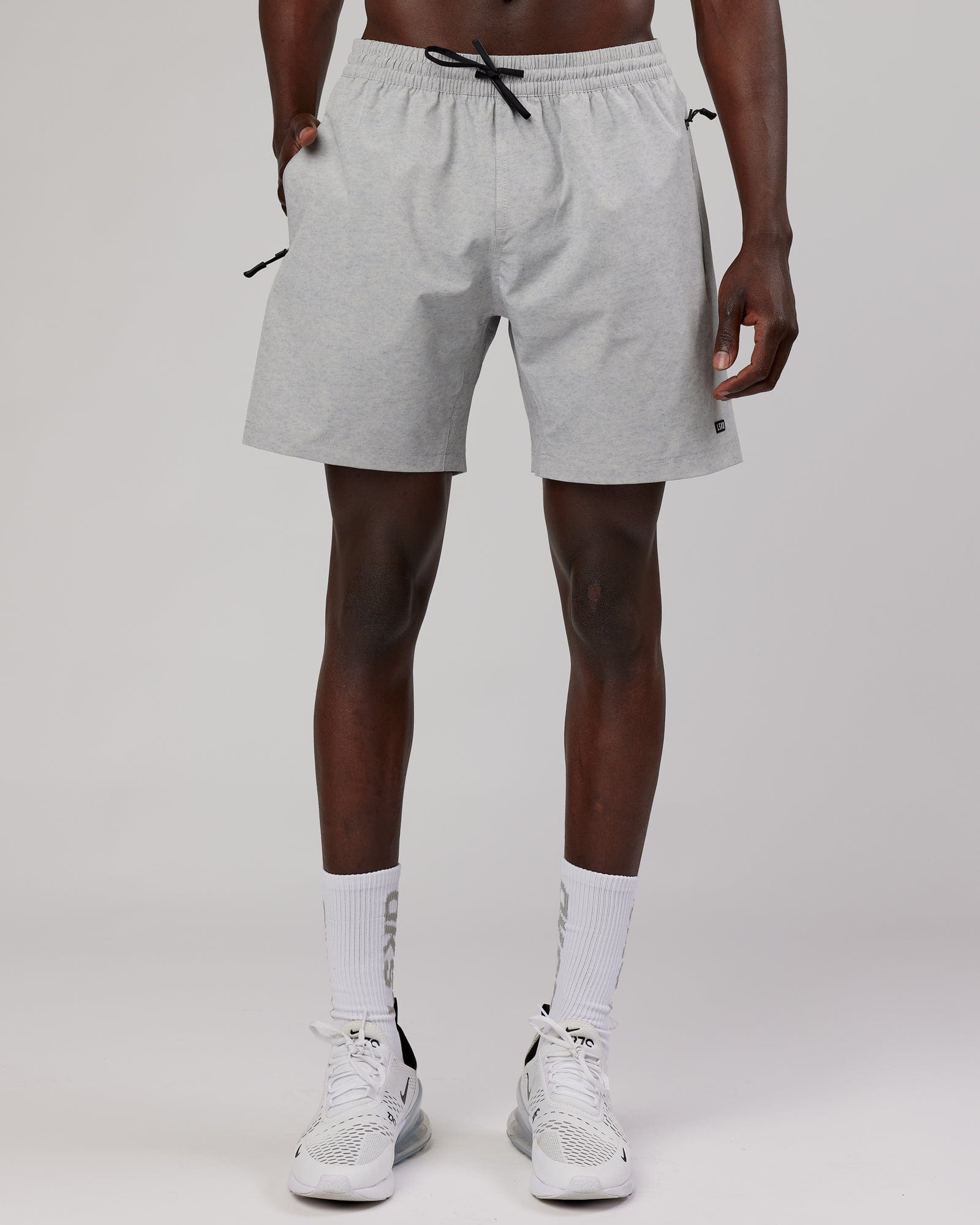 Model wearing Rep 7" Performance Short - Light Grey Marl