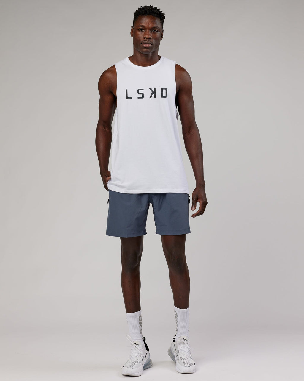 Model wearing Rep 7" Performance Short - Turbulence