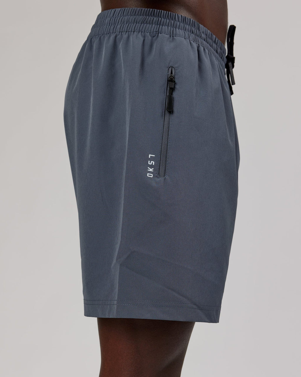 Model wearing Rep 7" Performance Short - Turbulence