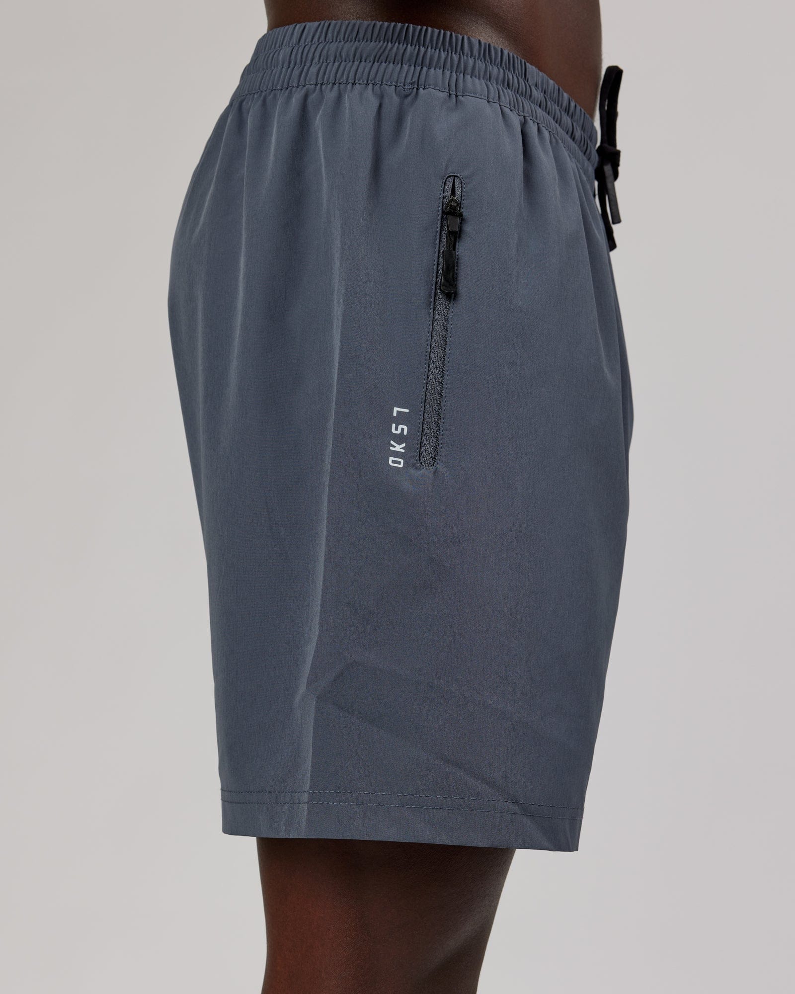 Model wearing Rep 7" Performance Short - Turbulence