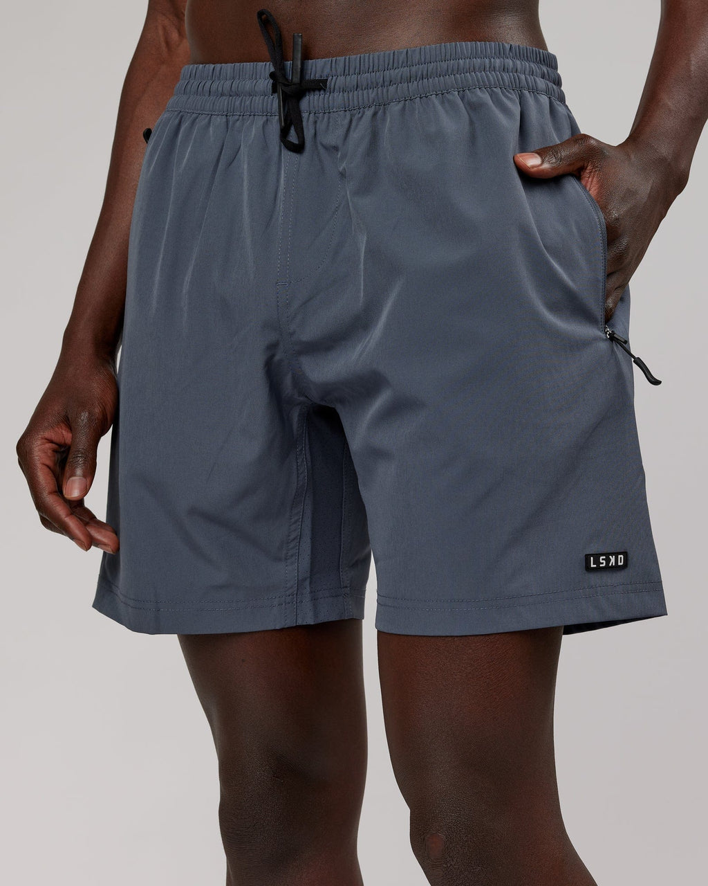 Model wearing Rep 7" Performance Short - Turbulence