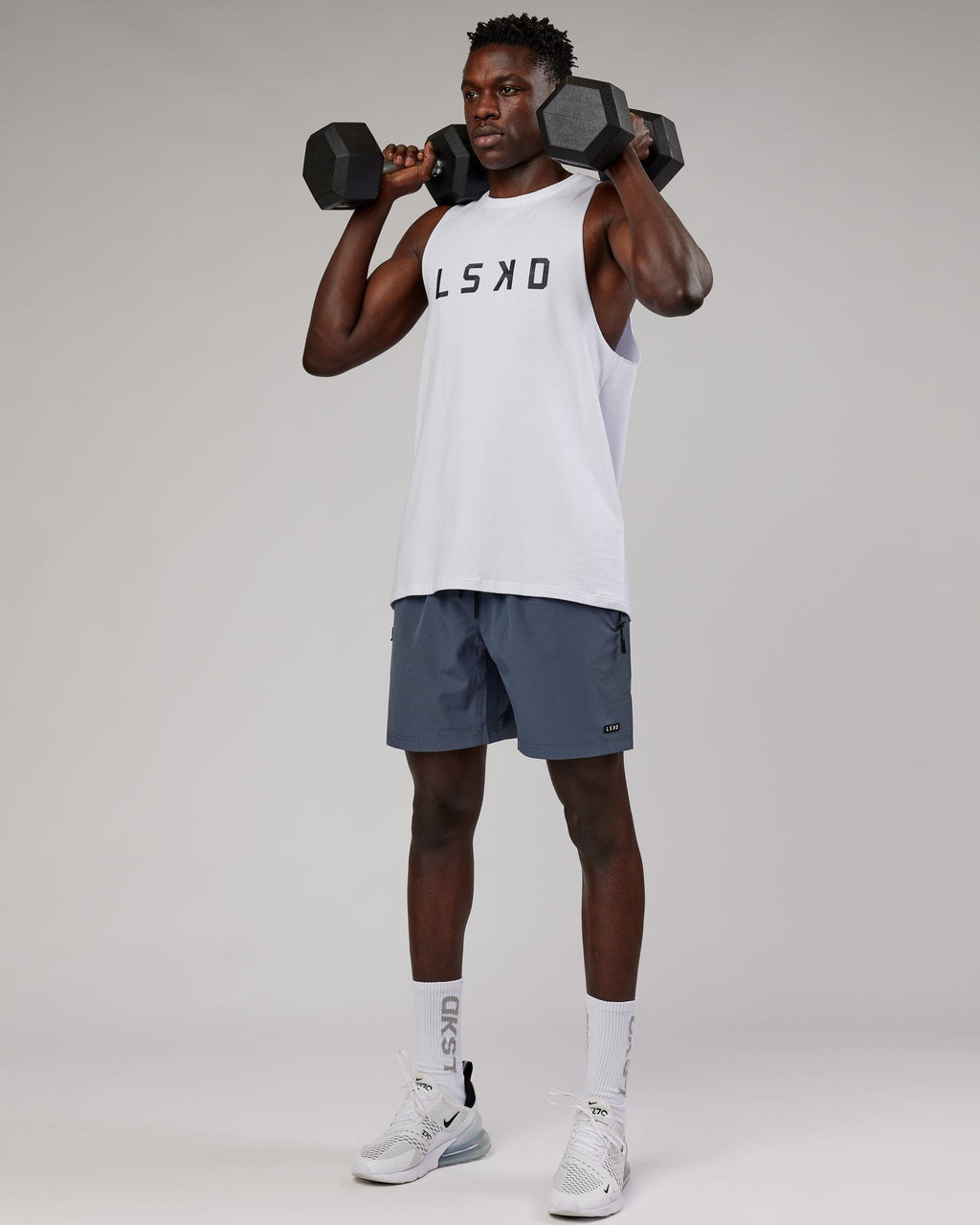 Model wearing Rep 7" Performance Short - Turbulence