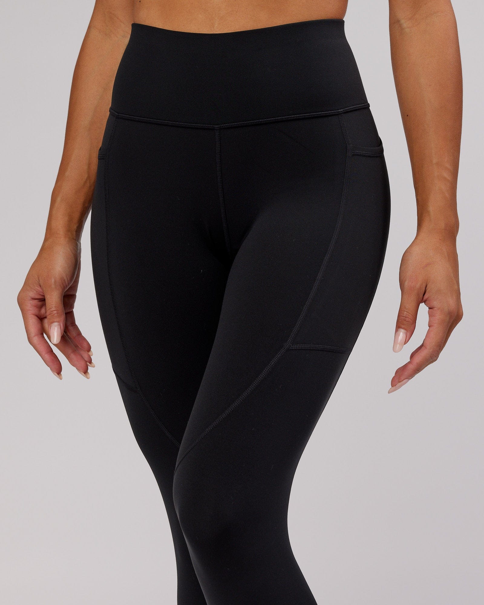 Model wearing Rep 7/8 Length Tight - Black-Flamingo