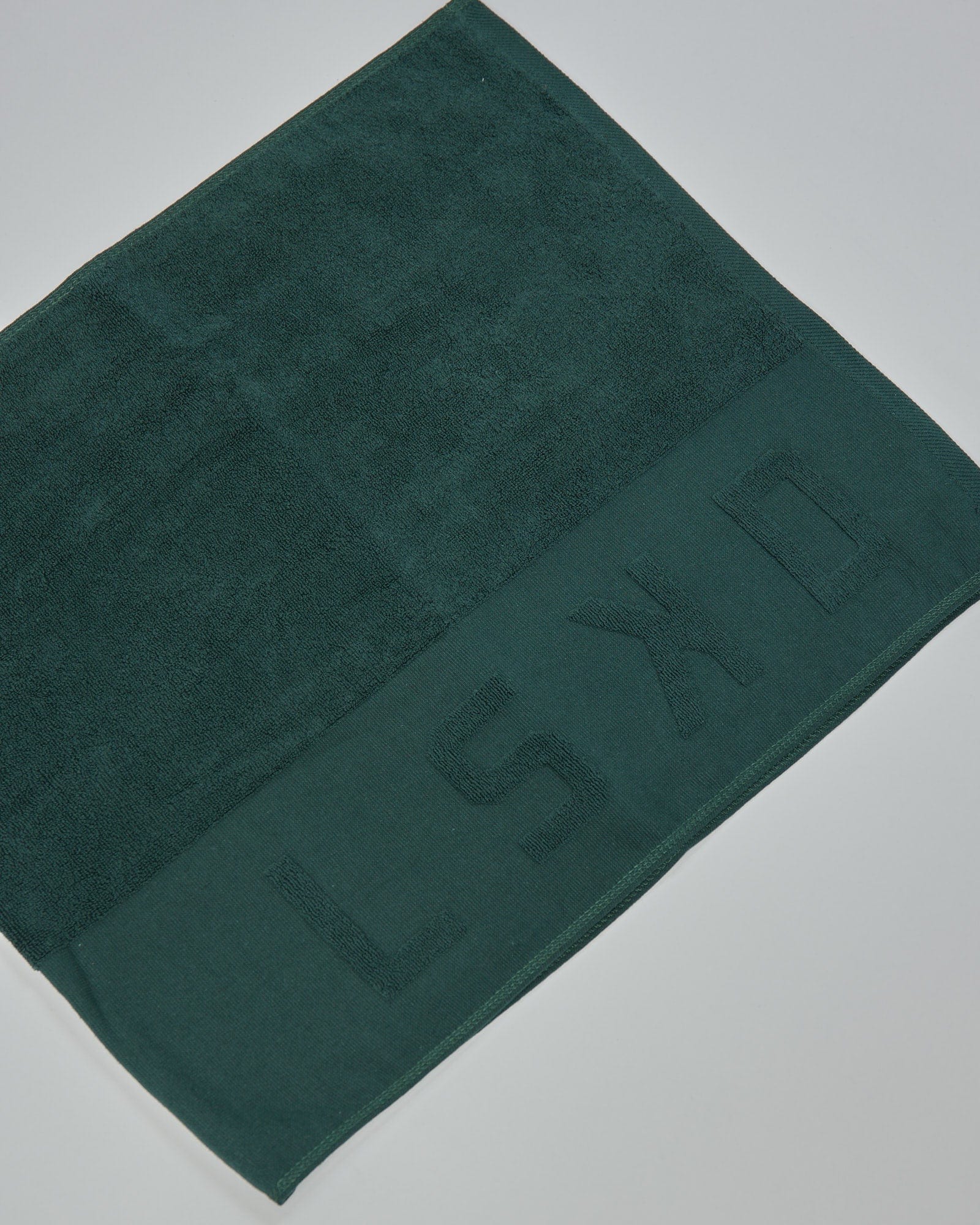 Model wearing Rep Cotton Towel - Vital Green