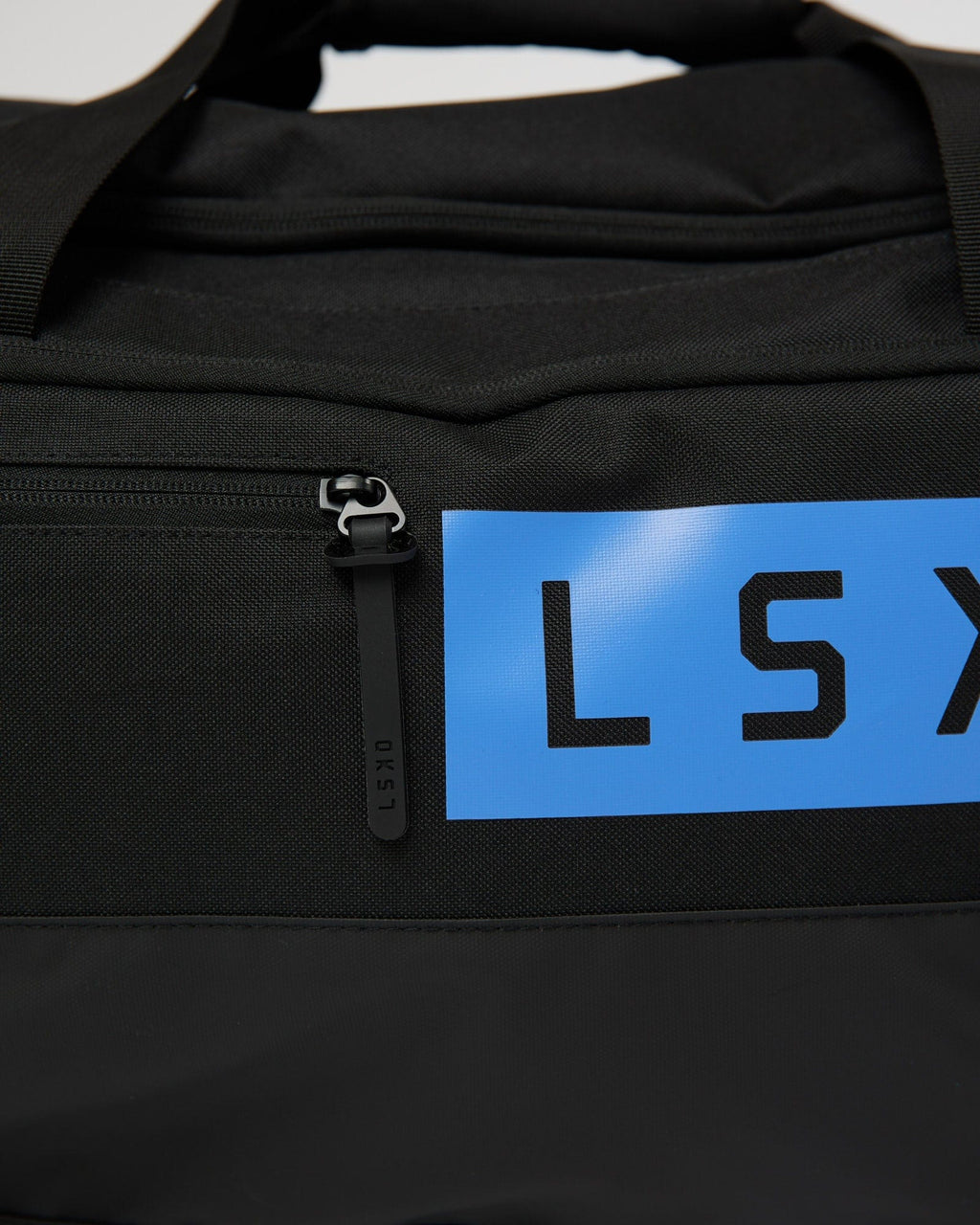 Model wearing Rep Duffle Bag 50L - Black-Cornflower Blue