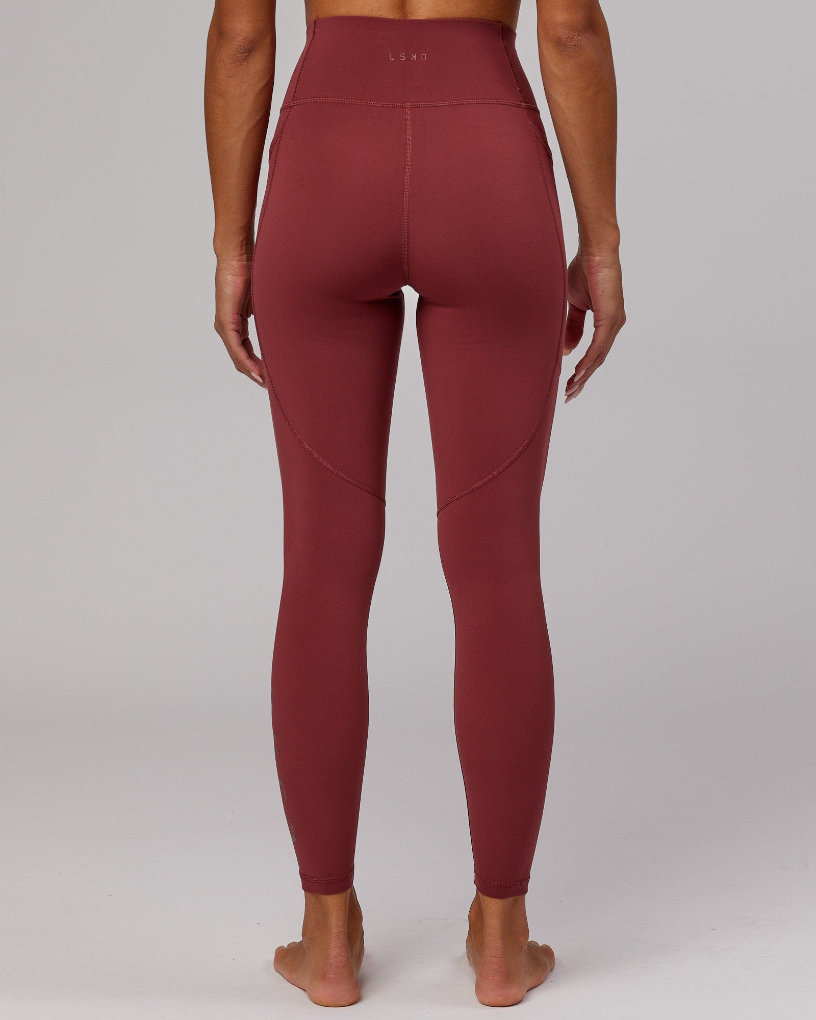 Model wearing Rep Full Length Tight - Apple Berry