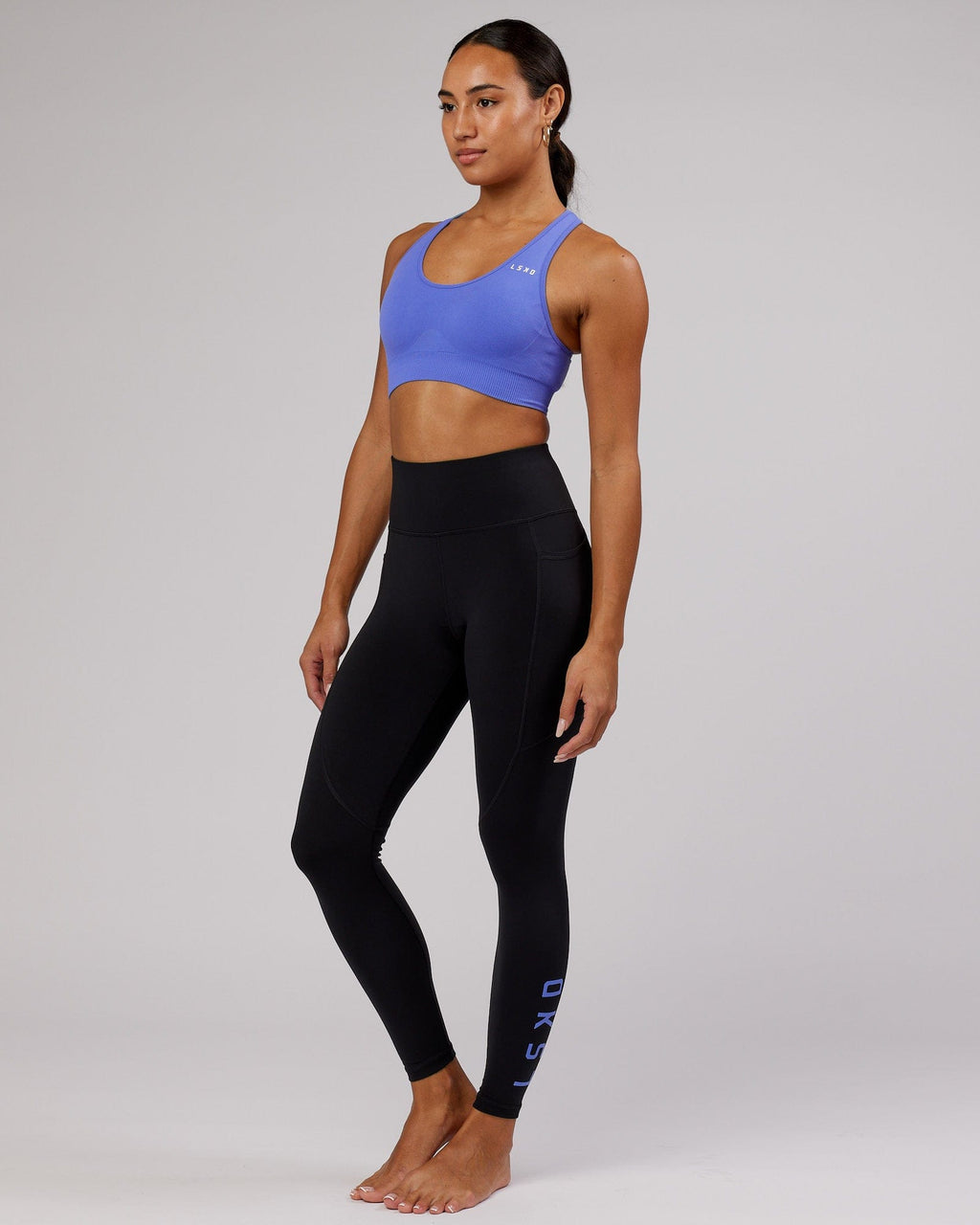 Model wearing Rep Full Length Tight - Black-Cornflower Blue