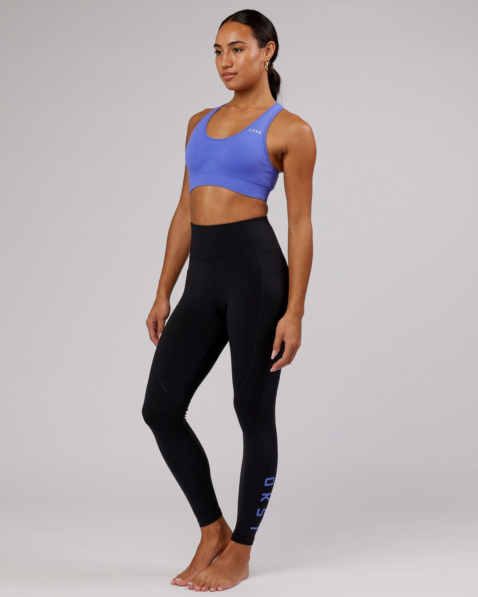 Model wearing Rep Full Length Tight - Black-Cornflower Blue