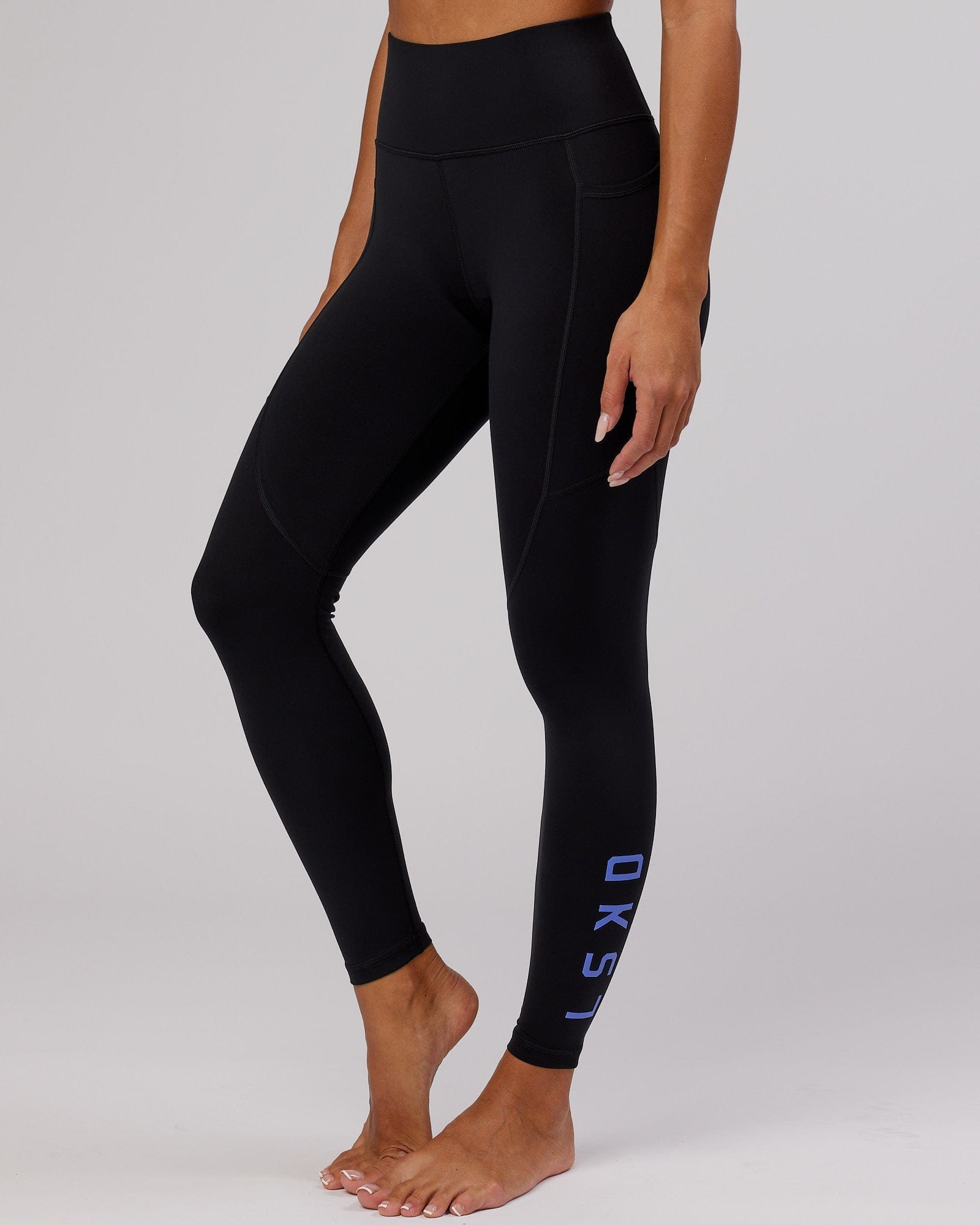 Model wearing Rep Full Length Tight - Black-Cornflower Blue