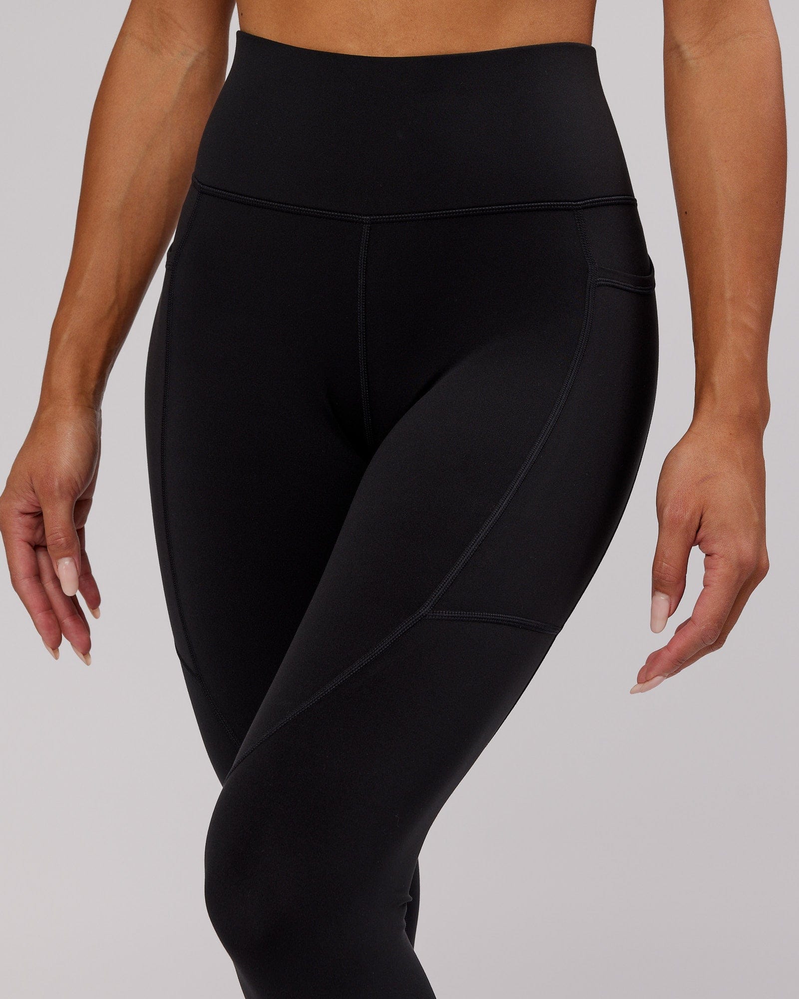 Model wearing Rep Full Length Tight - Black-Flamingo