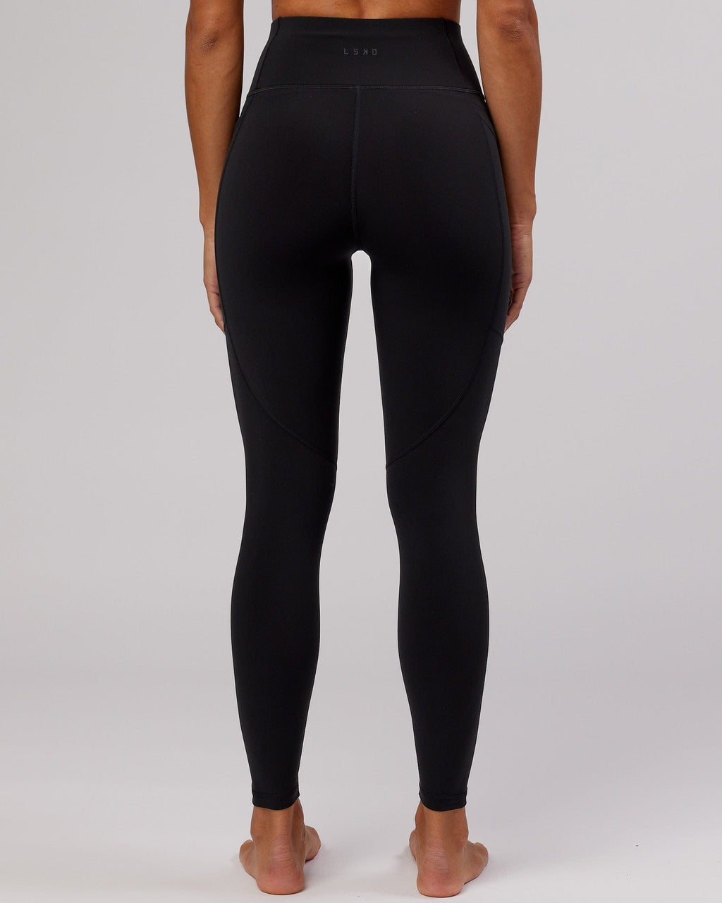 Model wearing Rep Full Length Tight - Black-Flamingo