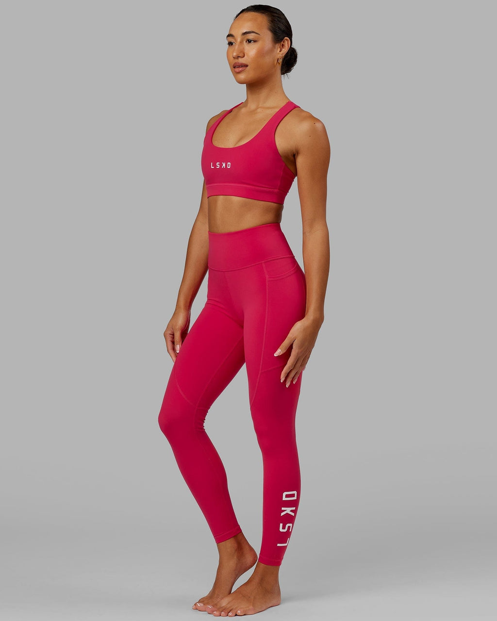 Model wearing Rep Full Length Tight - Boysenberry