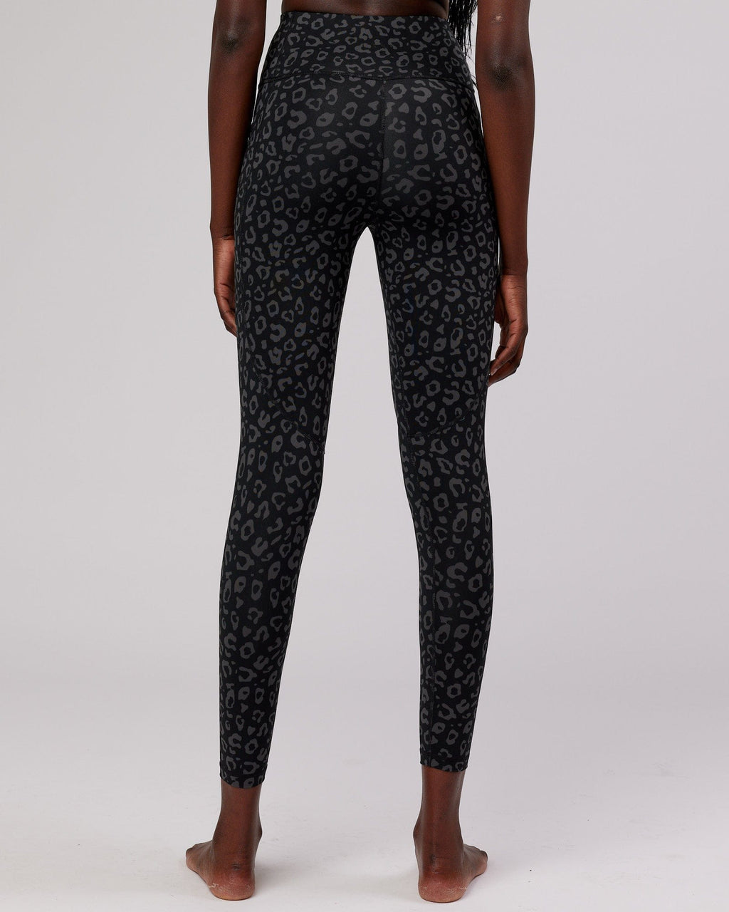 Model wearing Rep Full Length Tight Small Logo - Fever