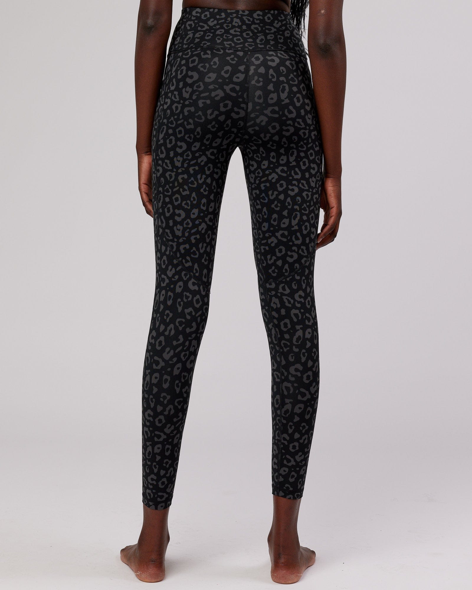 Model wearing Rep Full Length Tight Small Logo - Fever