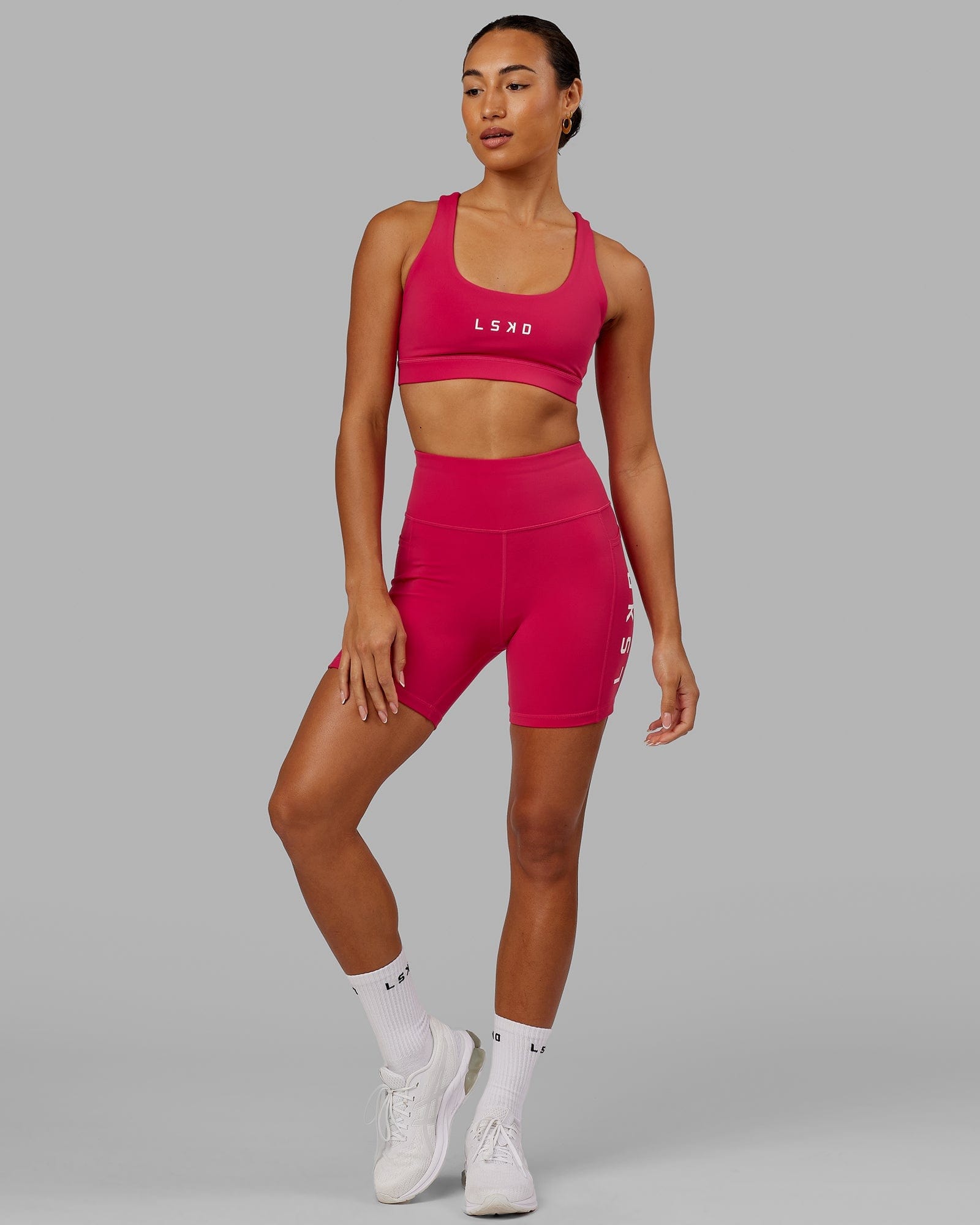 Model wearing Rep Mid Short Tight - Boysenberry