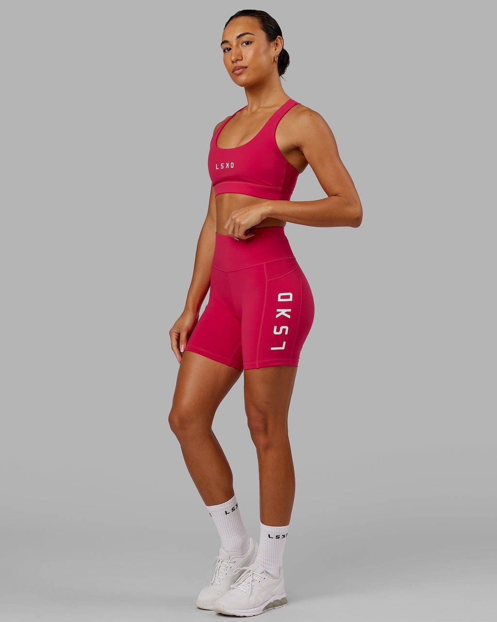 Model wearing Rep Mid Short Tight - Boysenberry