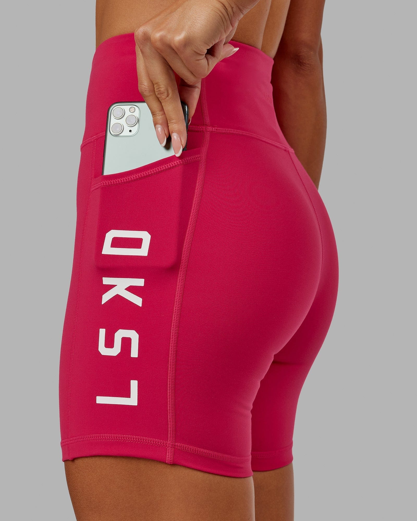 Model wearing Rep Mid Short Tight - Boysenberry