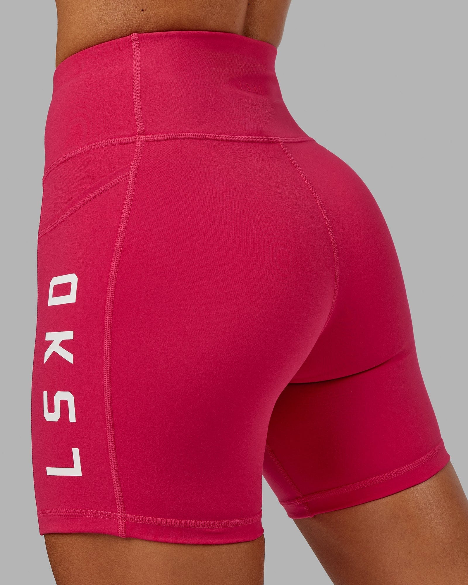 Model wearing Rep Mid Short Tight - Boysenberry