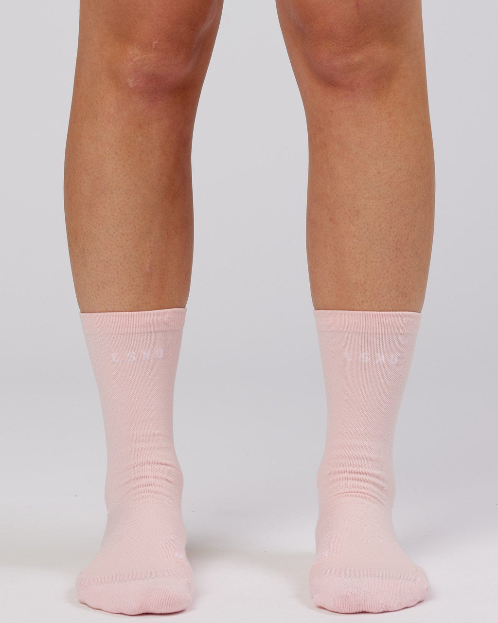 Model wearing Rep Performance Crew Sock - Pink