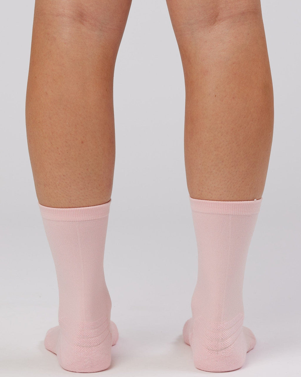 Model wearing Rep Performance Crew Sock - Pink