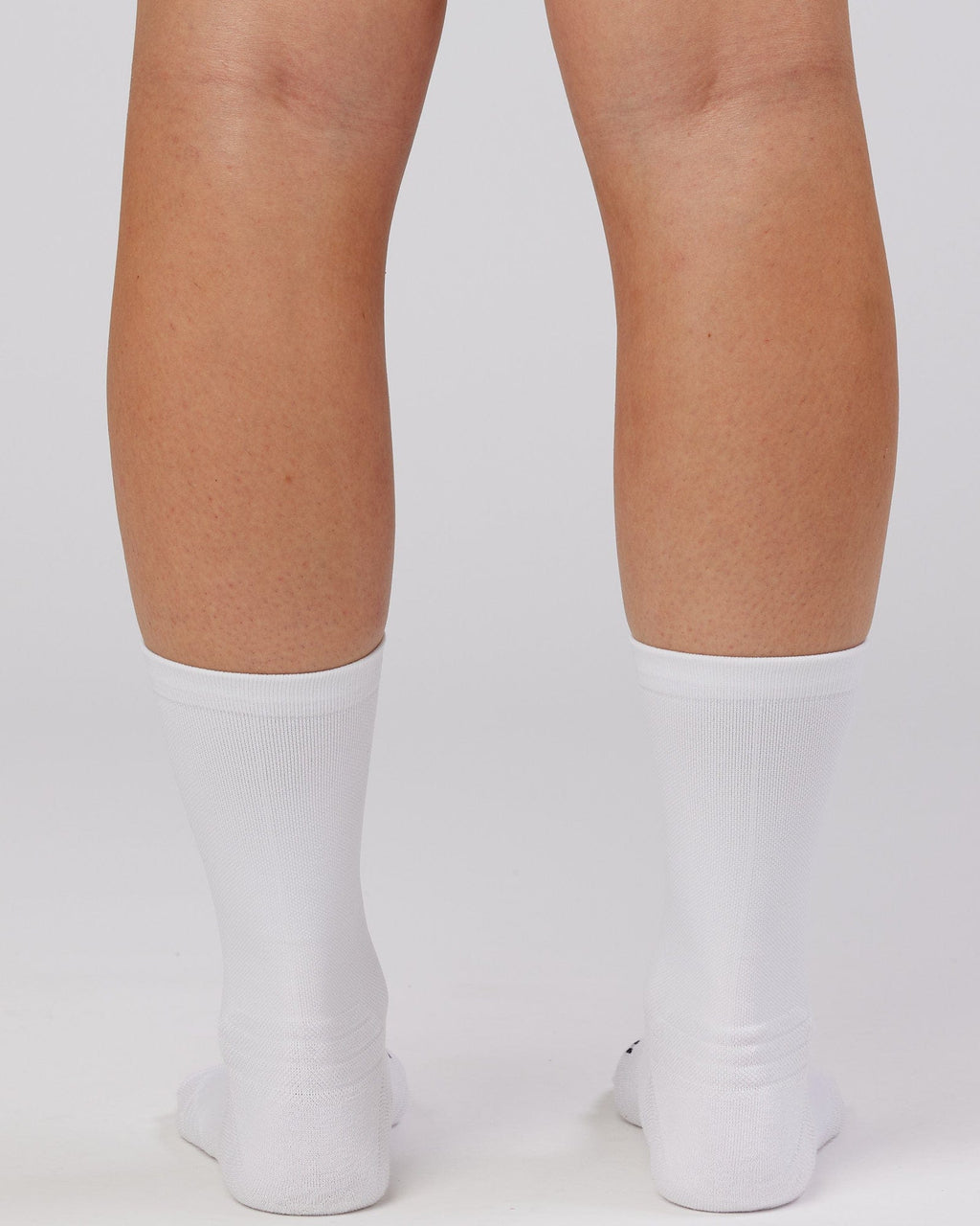 Model wearing Rep Performance Crew Sock - White
