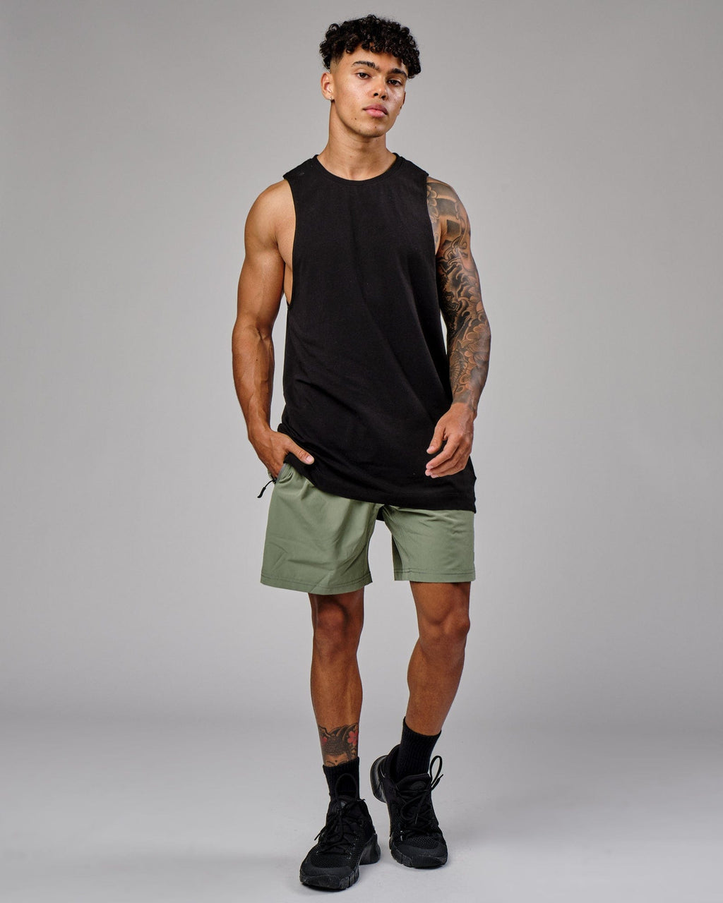 Model wearing Rep 7'' Performance Short - Sea Spray