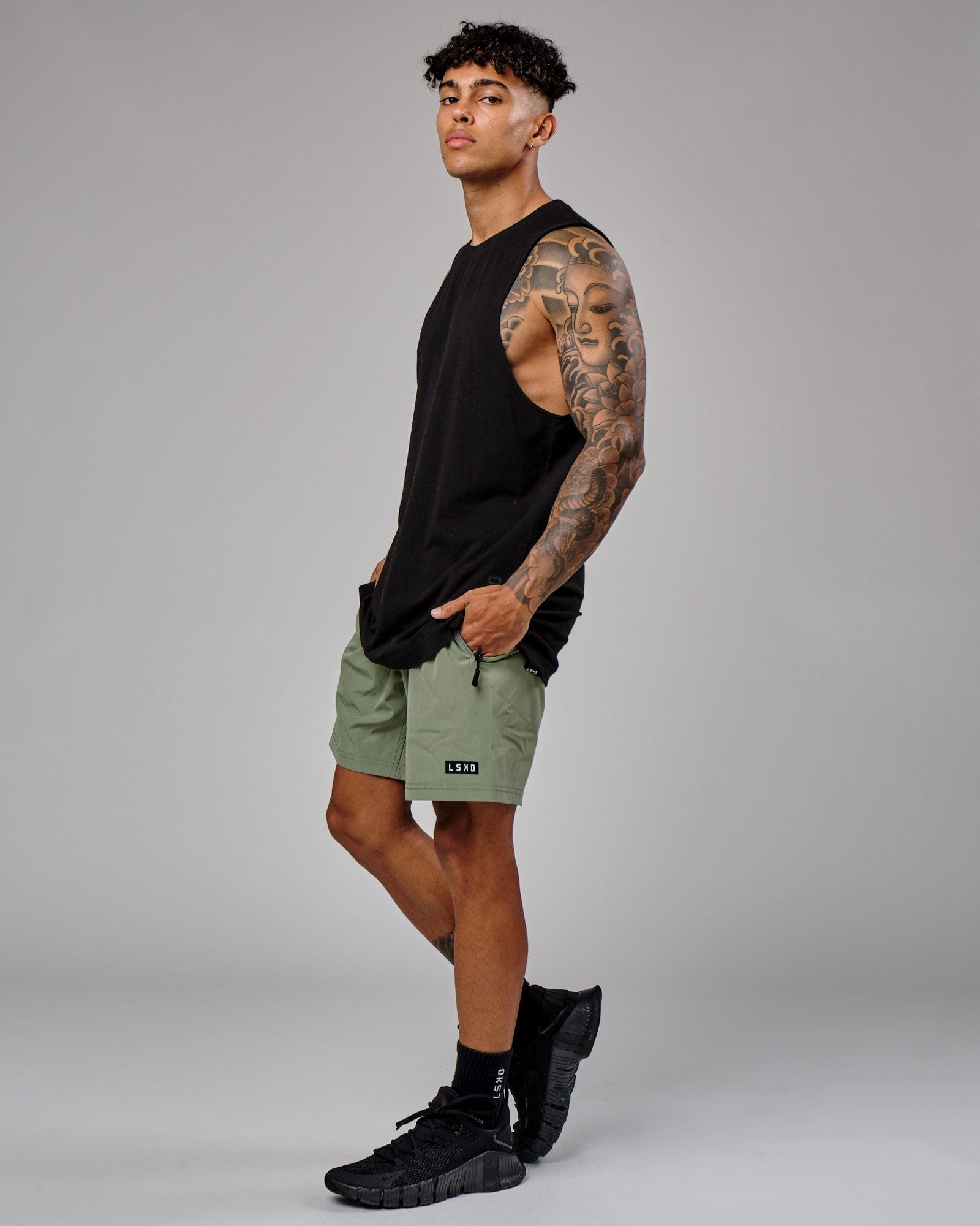 Model wearing Rep 7'' Performance Short - Sea Spray