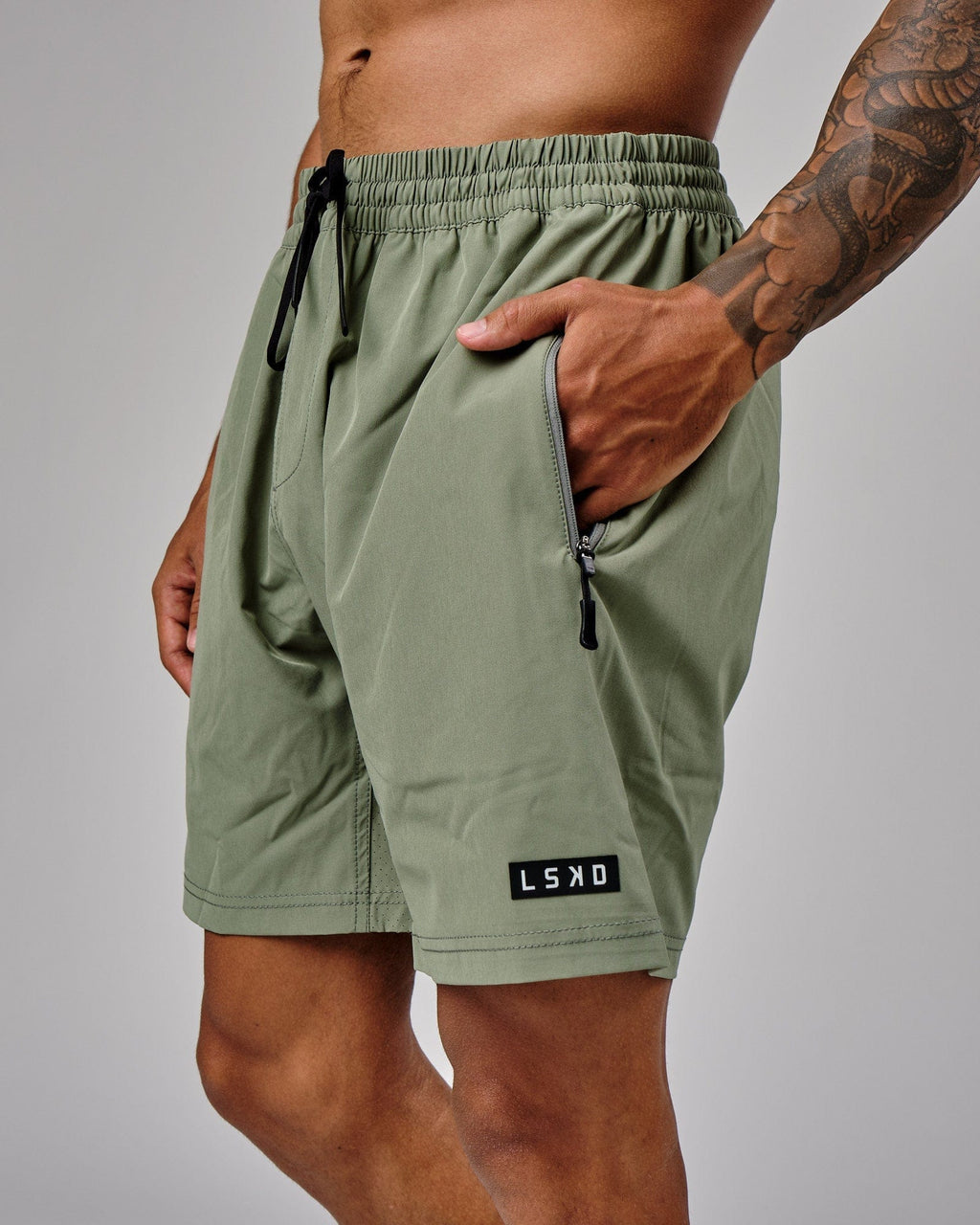 Model wearing Rep 7'' Performance Short - Sea Spray