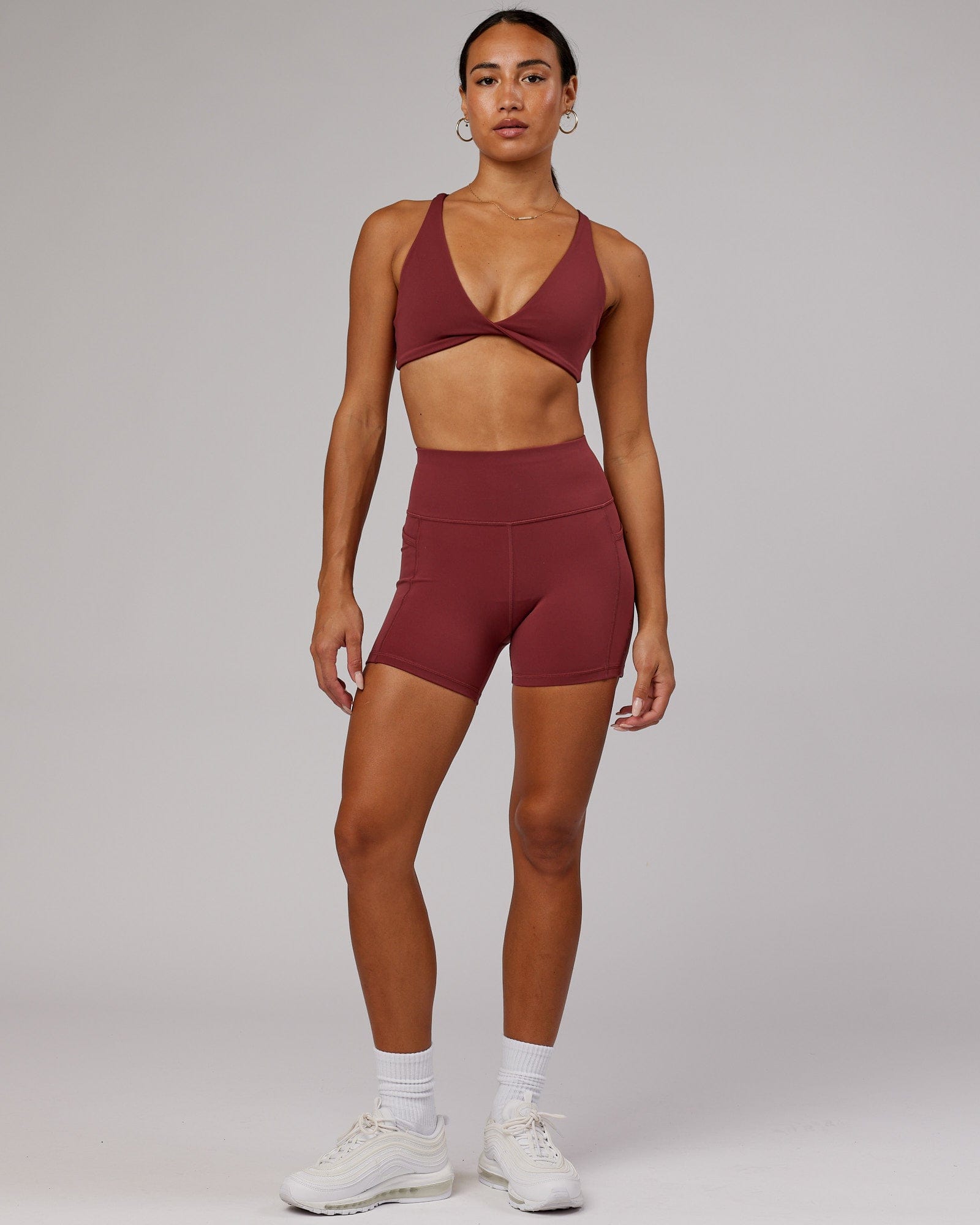 Model wearing Rep X-Short Tight - Apple Berry