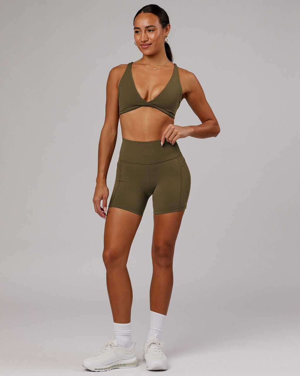 Model wearing Rep X-Short Tight - Army Green