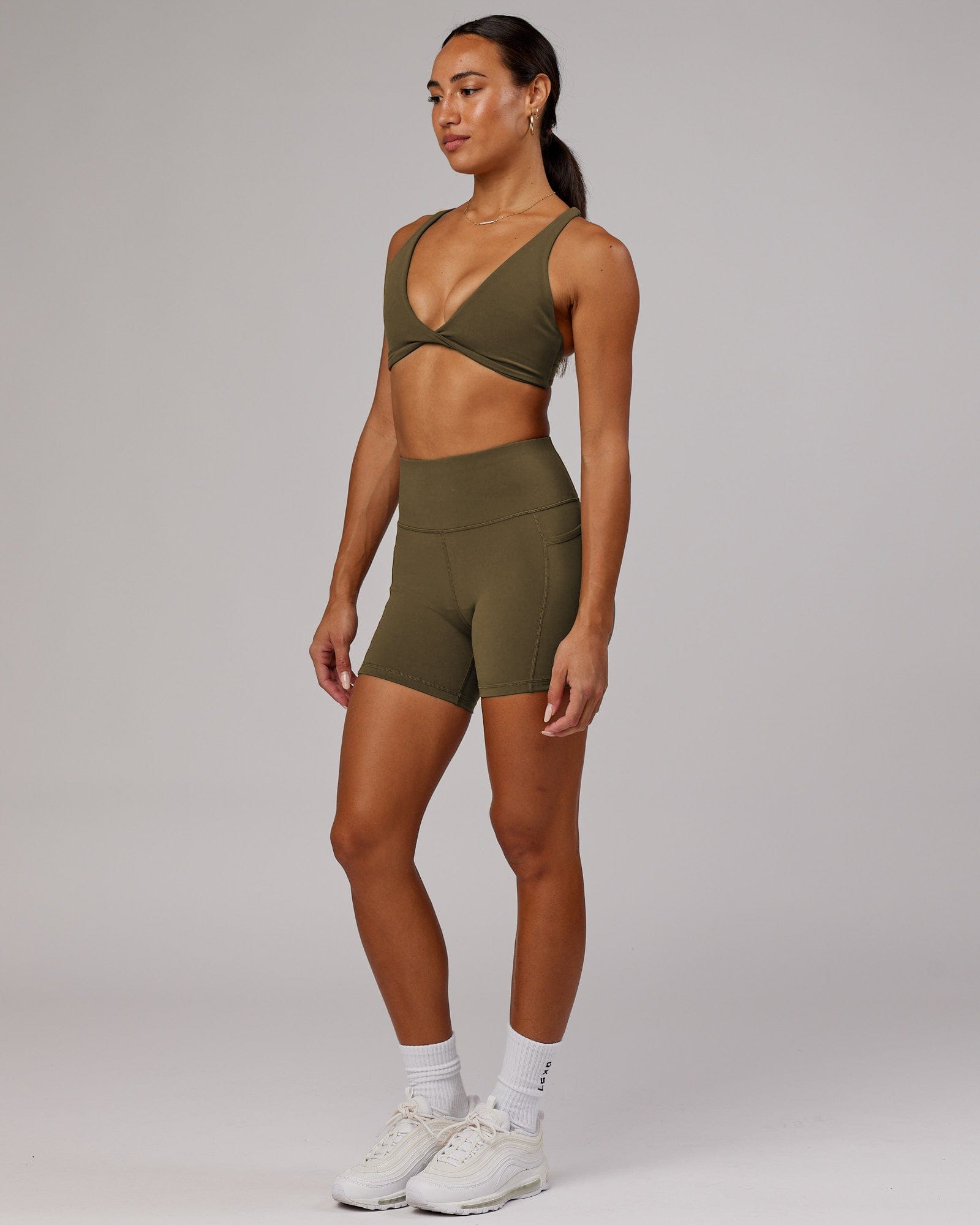 Model wearing Rep X-Short Tight - Army Green